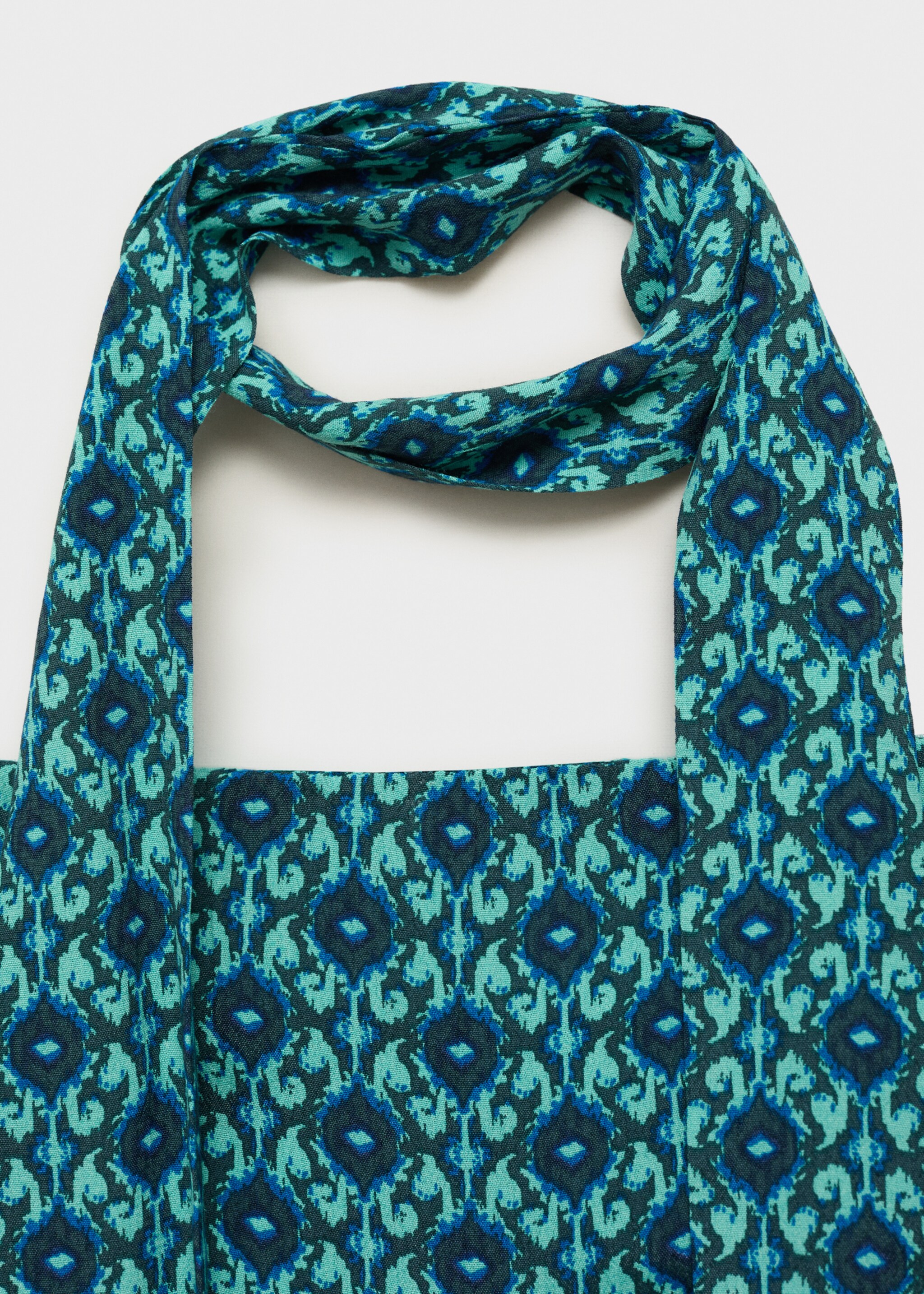 Printed jumpsuit with bow - Details of the article 8, Turquoise. Ref: 87066356-00.