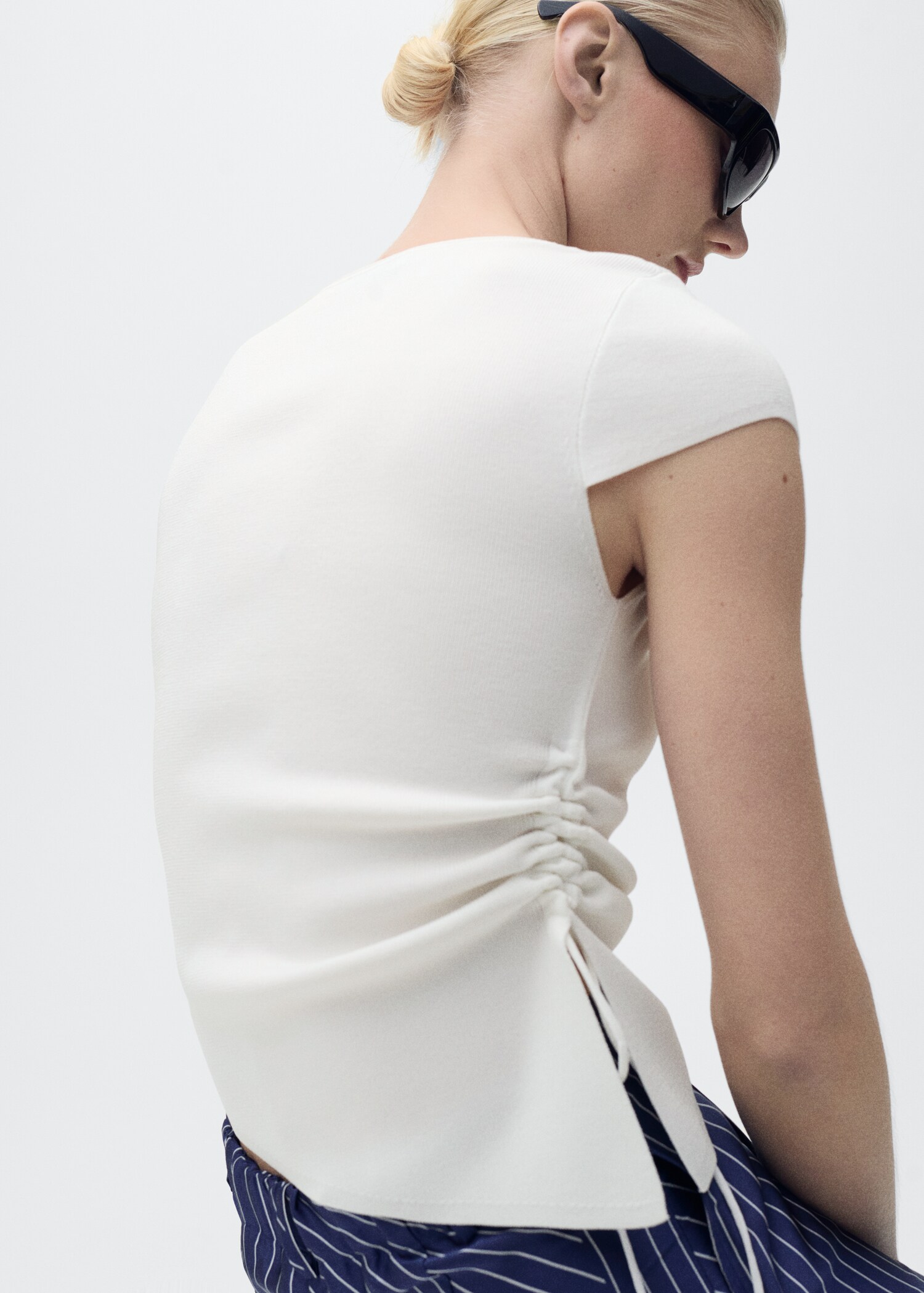 Asymmetrical low knit jersey - Reverse of the article