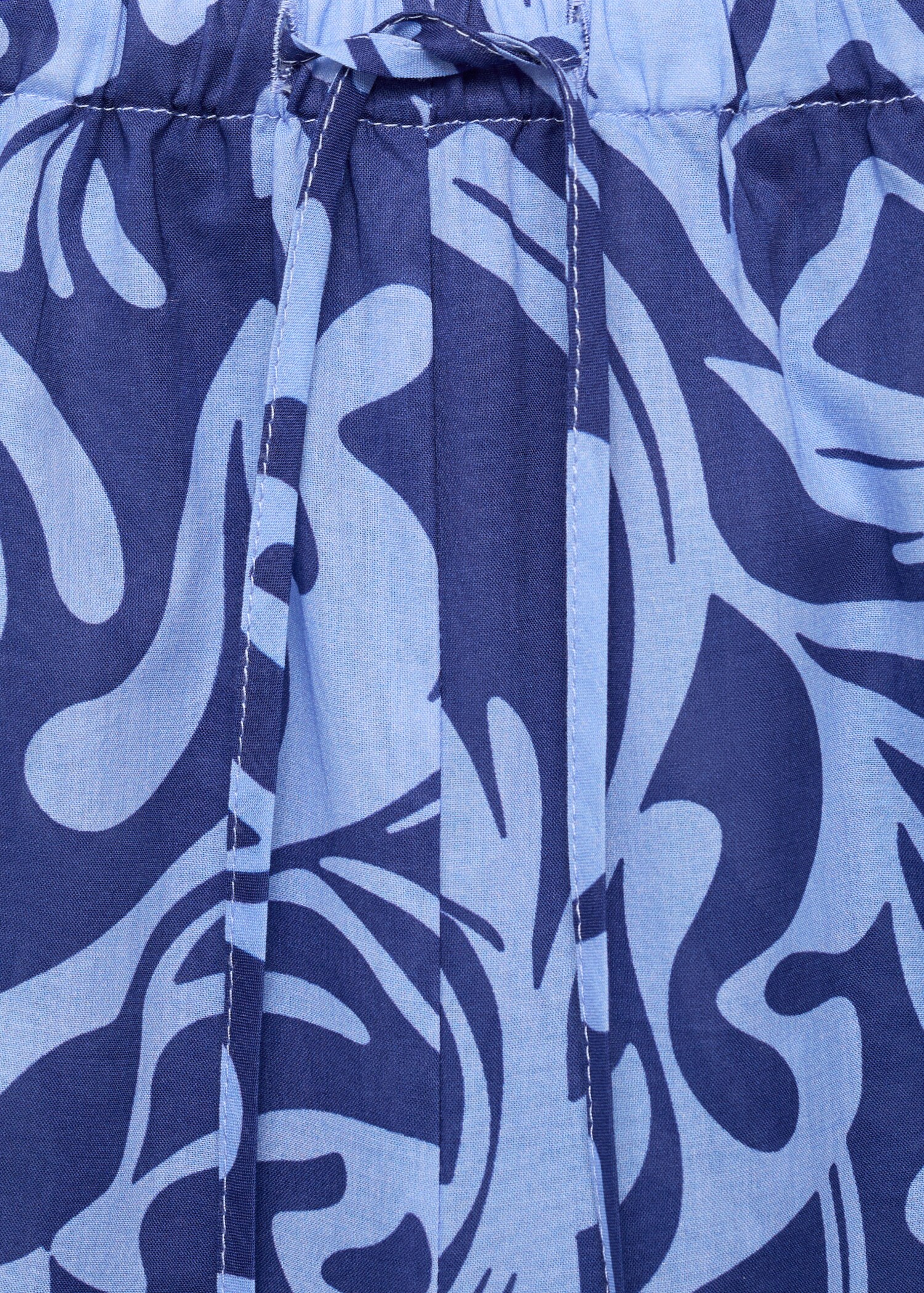 Cotton two-tone printed trousers - Details of the article 0