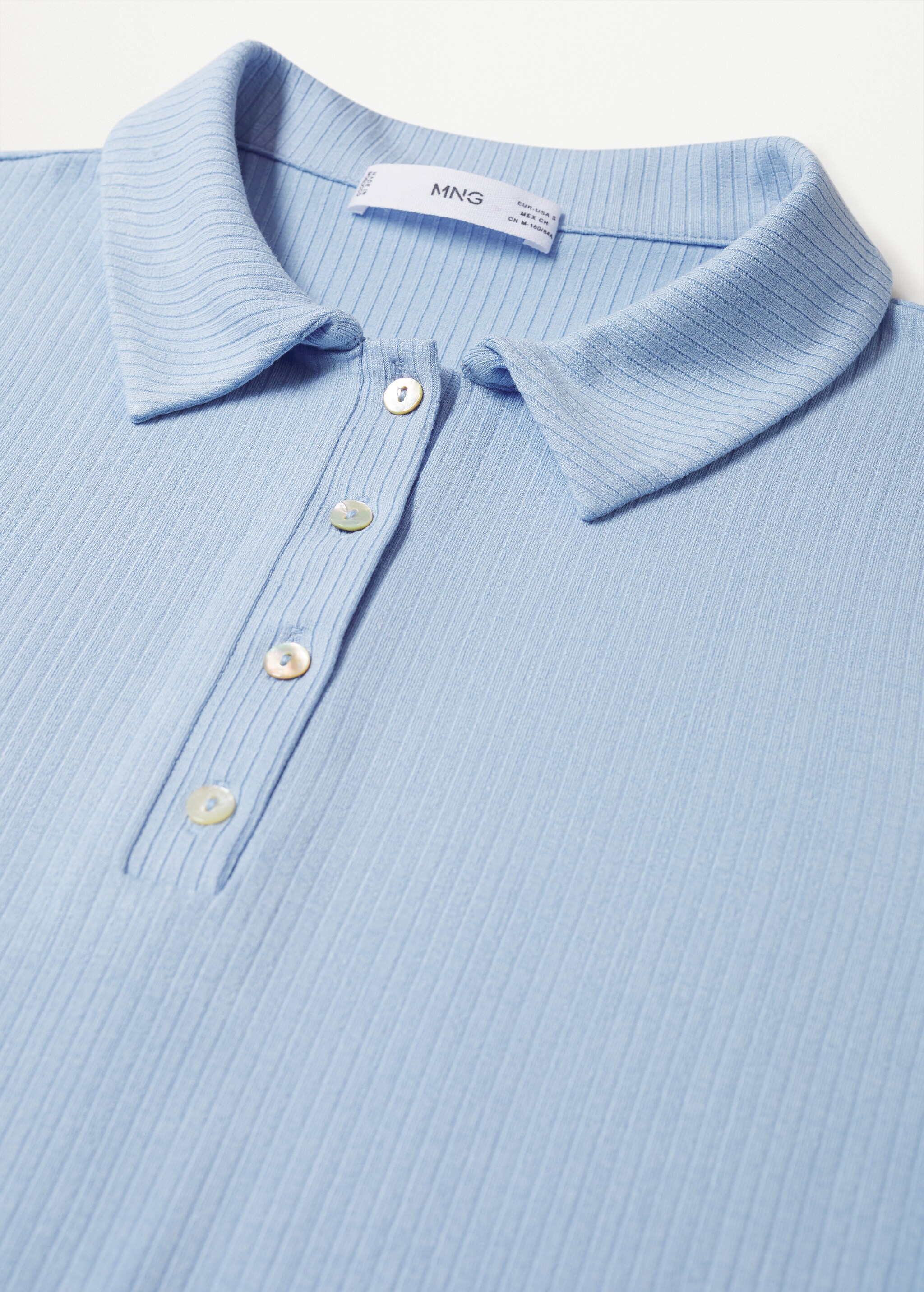 Polo canalé - Detalle del artículo 8