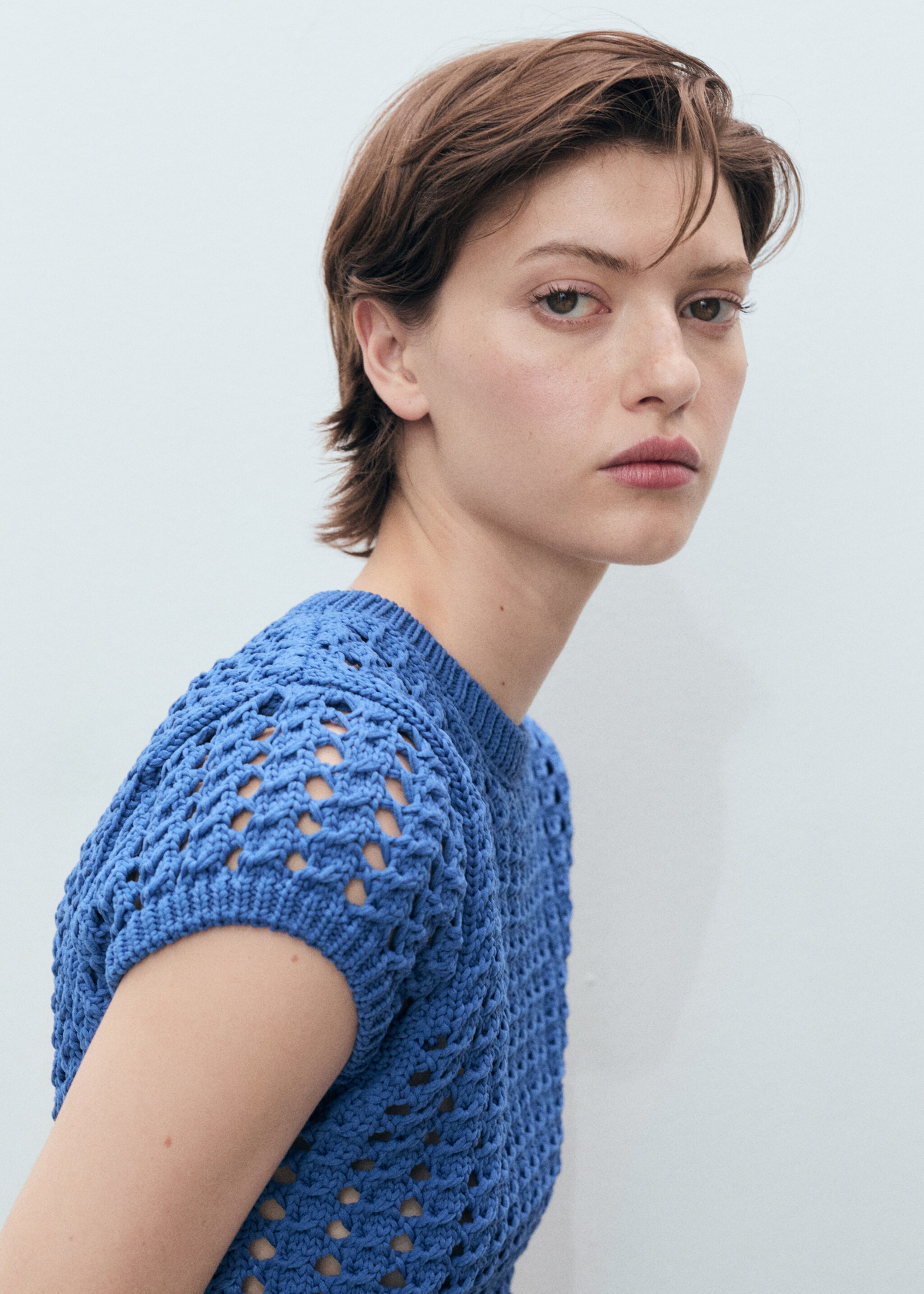 Short-sleeved crochet sweater - Details of the article 1, Blue. Ref: 87068643-00.