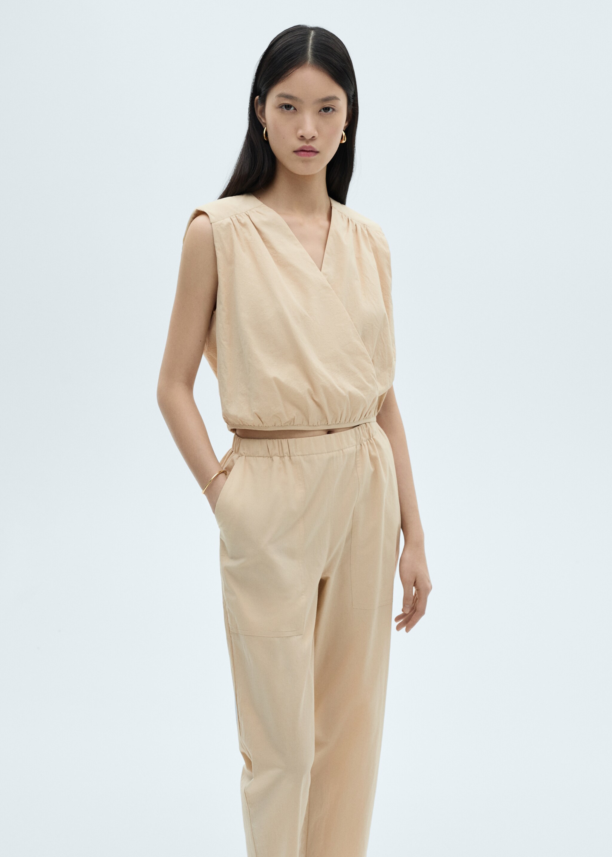 Baumwollhose in 7/8-Länge - Detail des Artikels 1, Beige. Ref: 87070578-00.