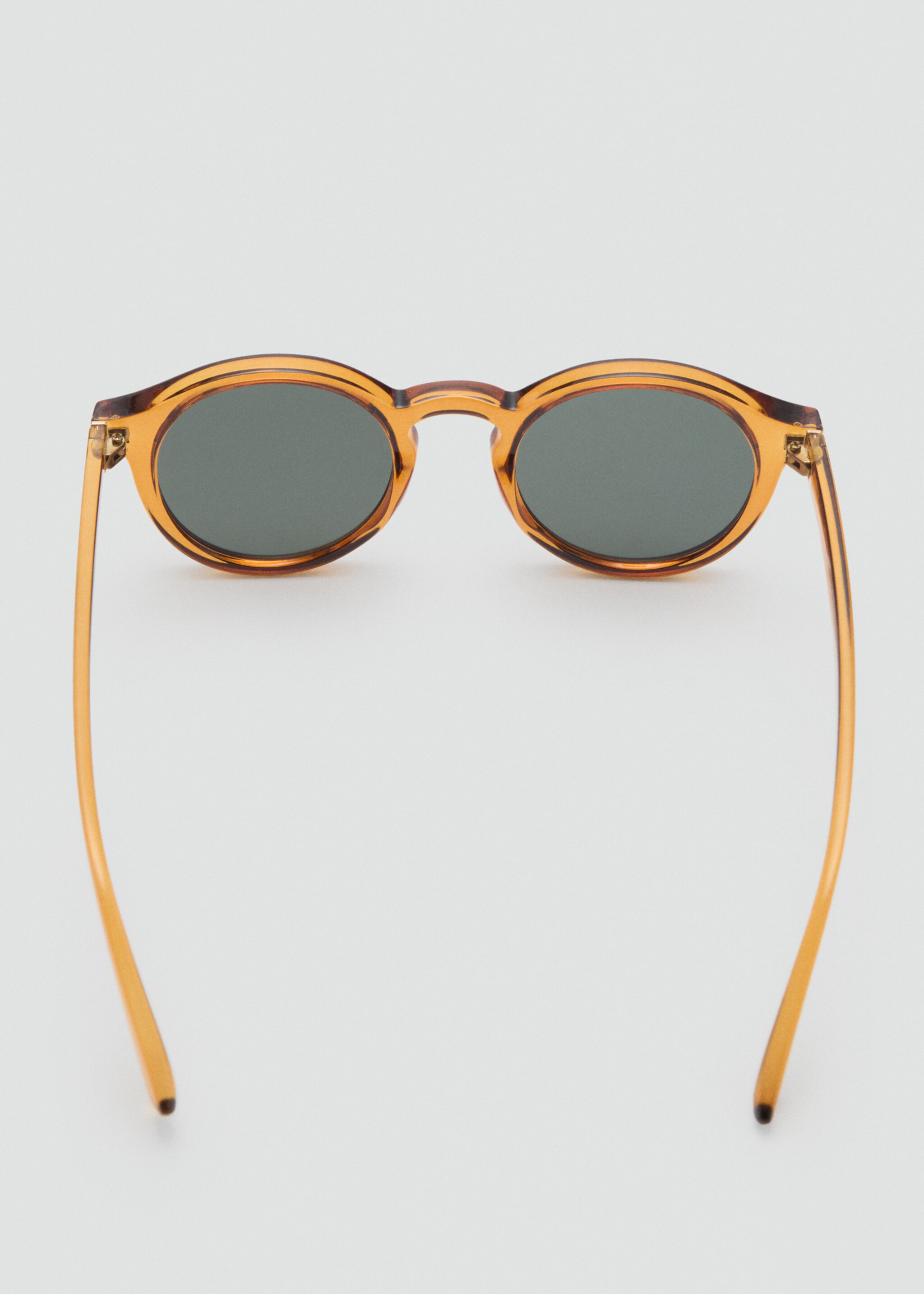 Round-framed sunglasses - Details of the article 1, Ochre. Ref: 87070605-00.