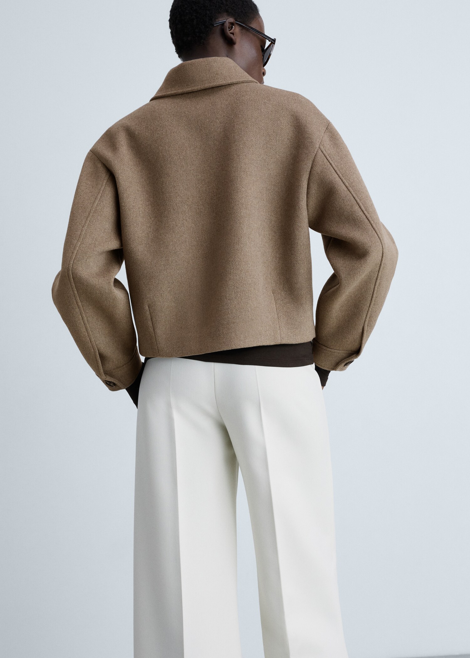 Wool jacket with pockets - Reverse of the article