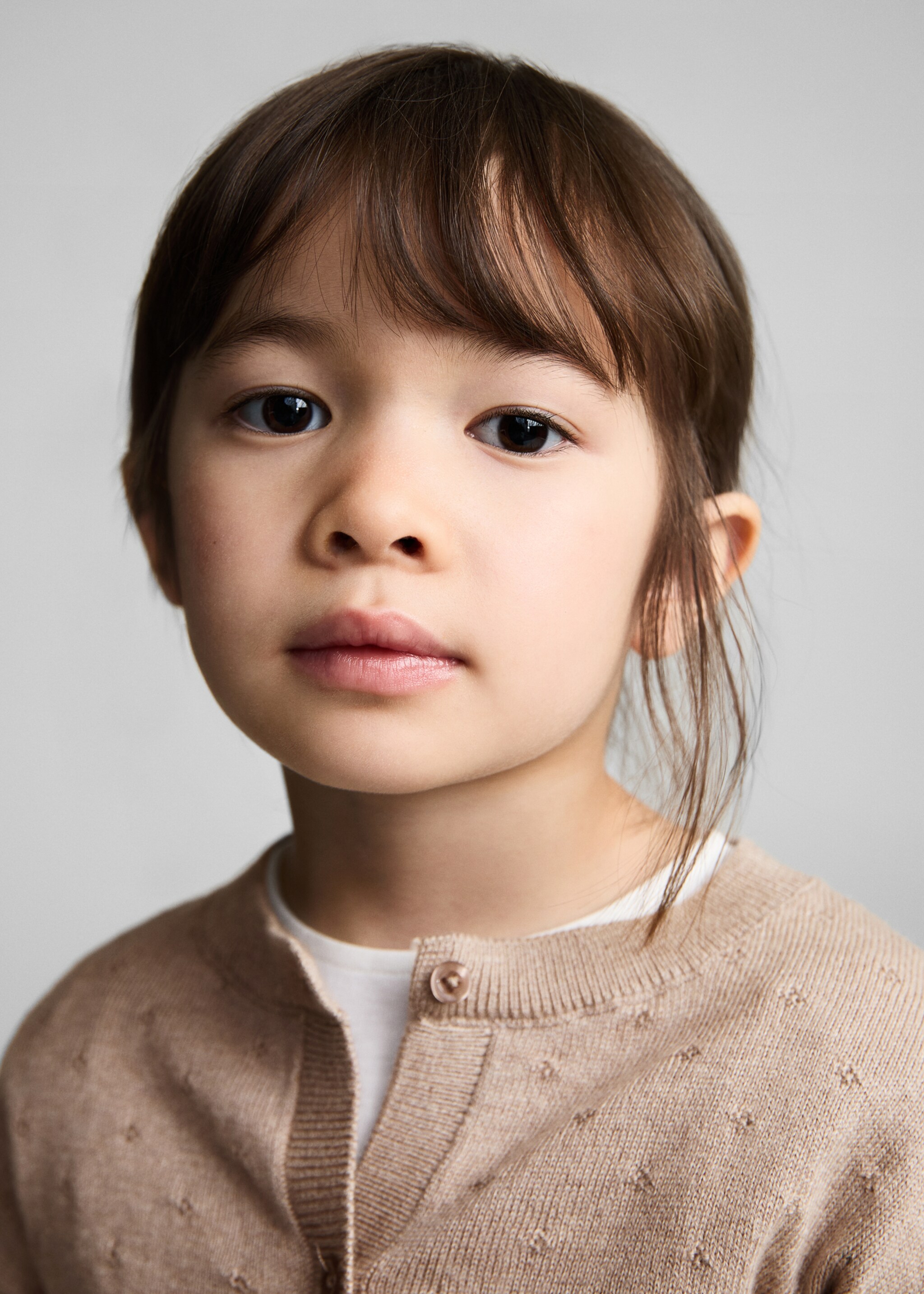 Button knit cardigan - Details of the article 1, Sand. Ref: 87071055-00.