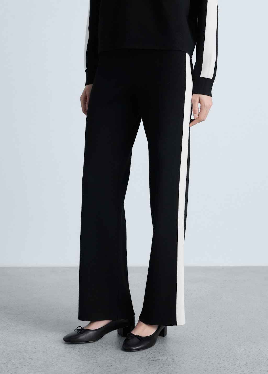 Knitted pants with contrasting stripes - Women | MANGO OUTLET USA