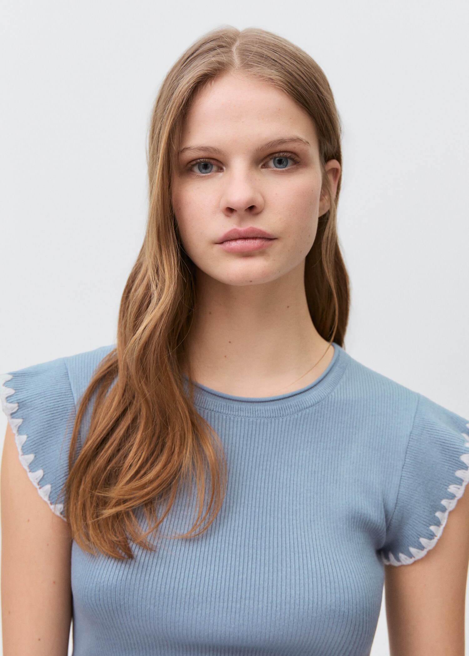 Top detalle volante - Detalle del artículo 1