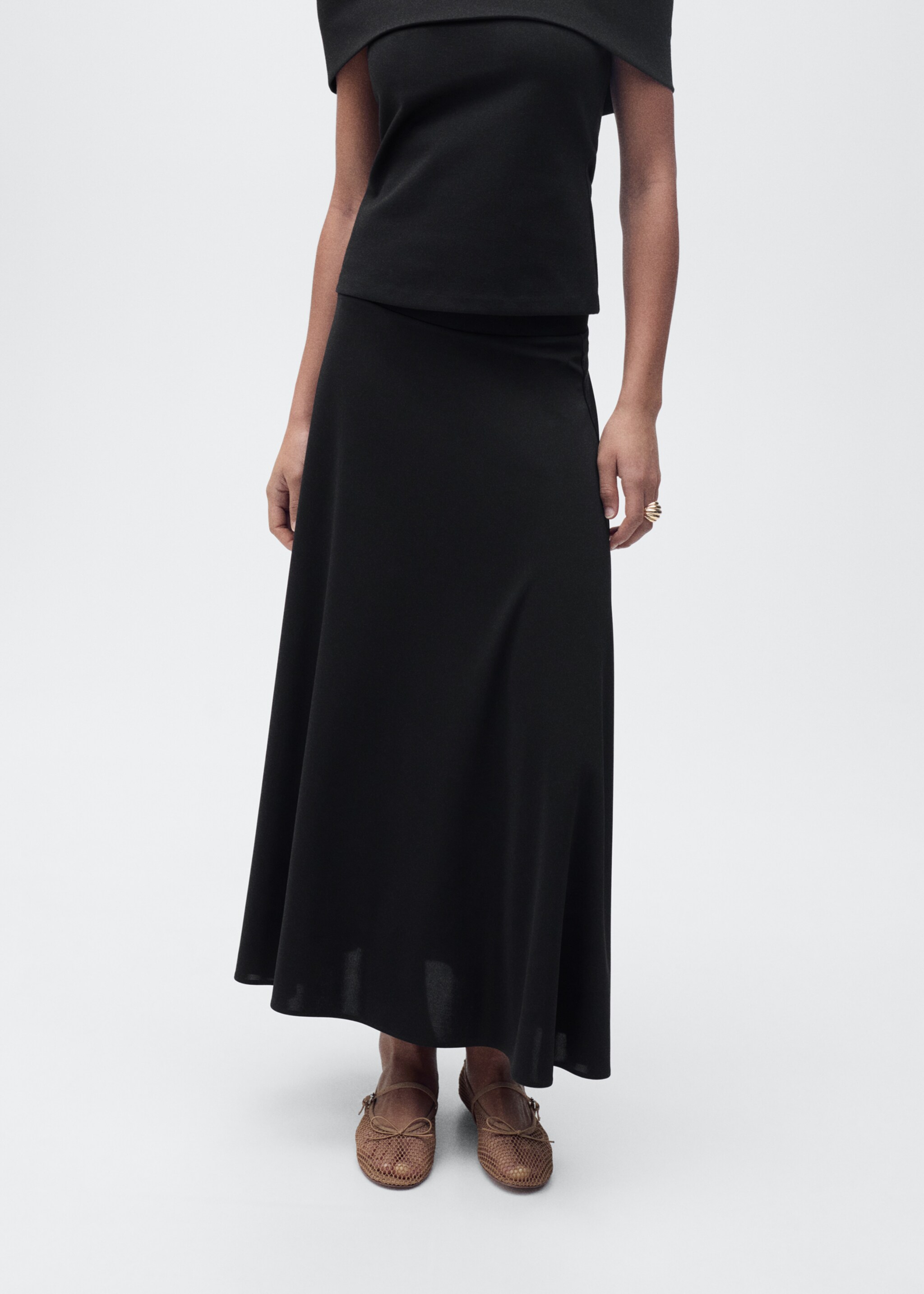 Flared knitted skirt - Medium plane, Black. Ref: 87075747-00.