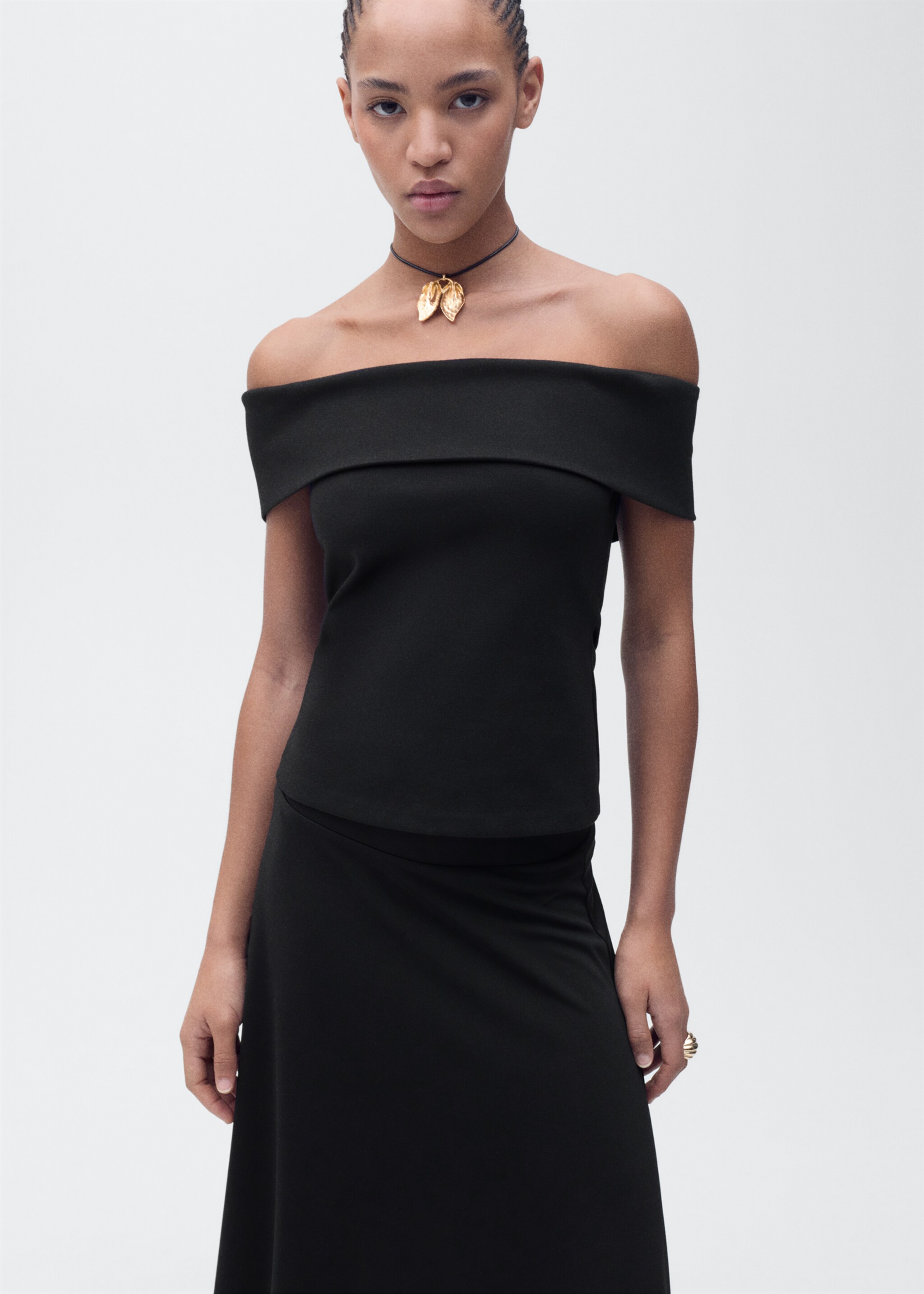 Flared knitted skirt - Details of the article 1, Black. Ref: 87075747-00.