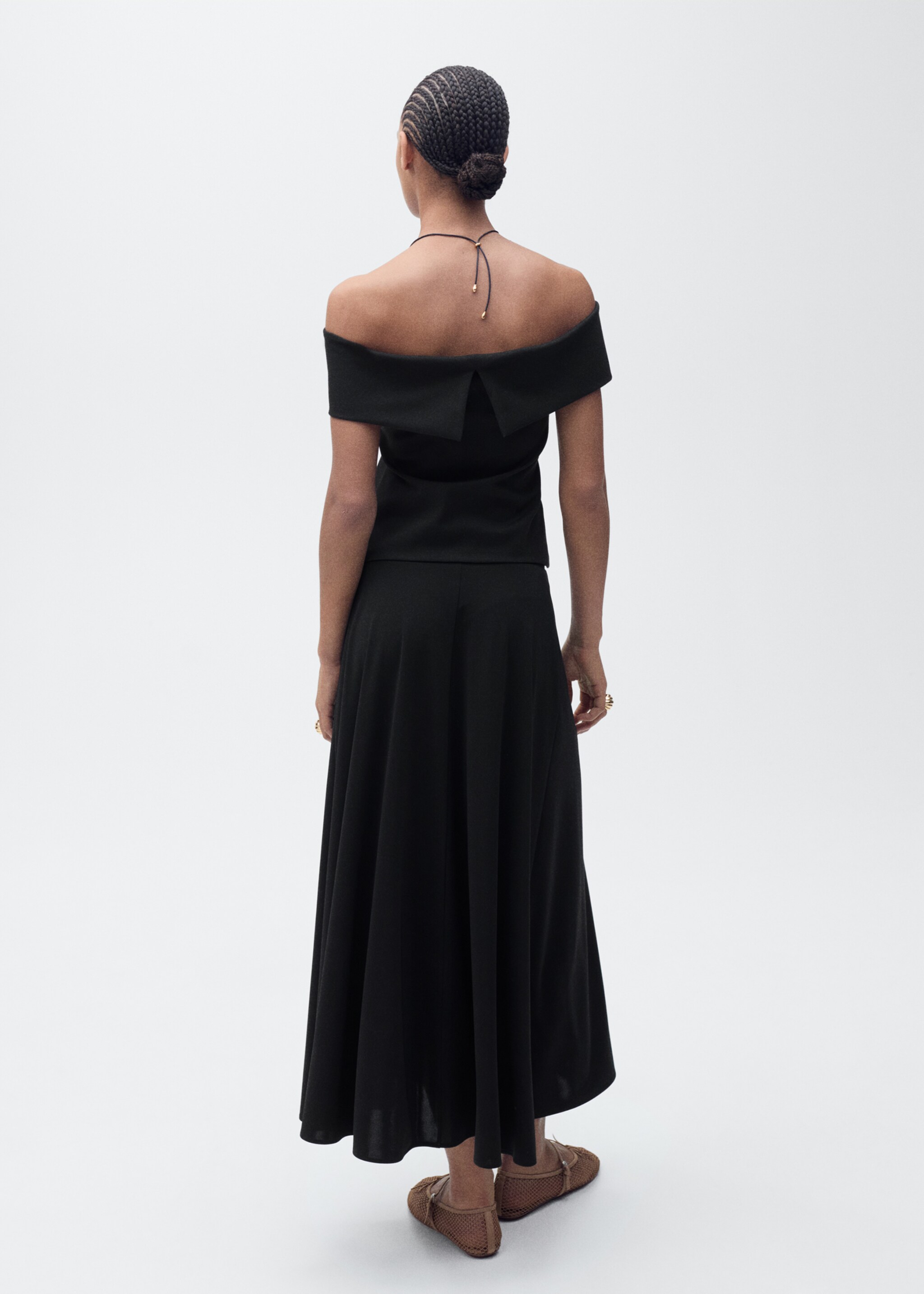 Flared knitted skirt - Reverse of the article, Black. Ref: 87075747-00.