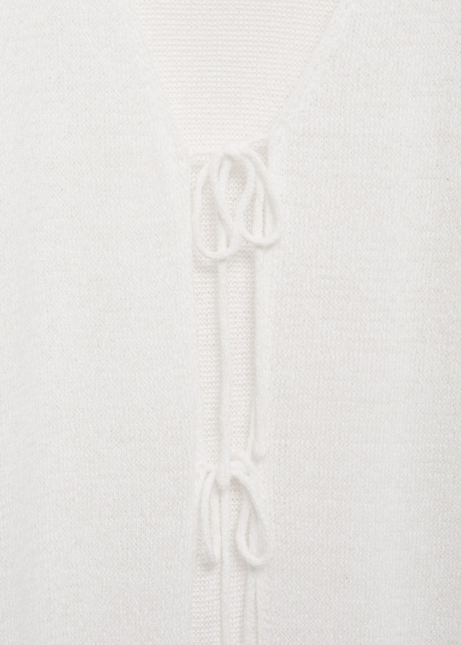 Lang gebreid vest - Detail van het artikel 8