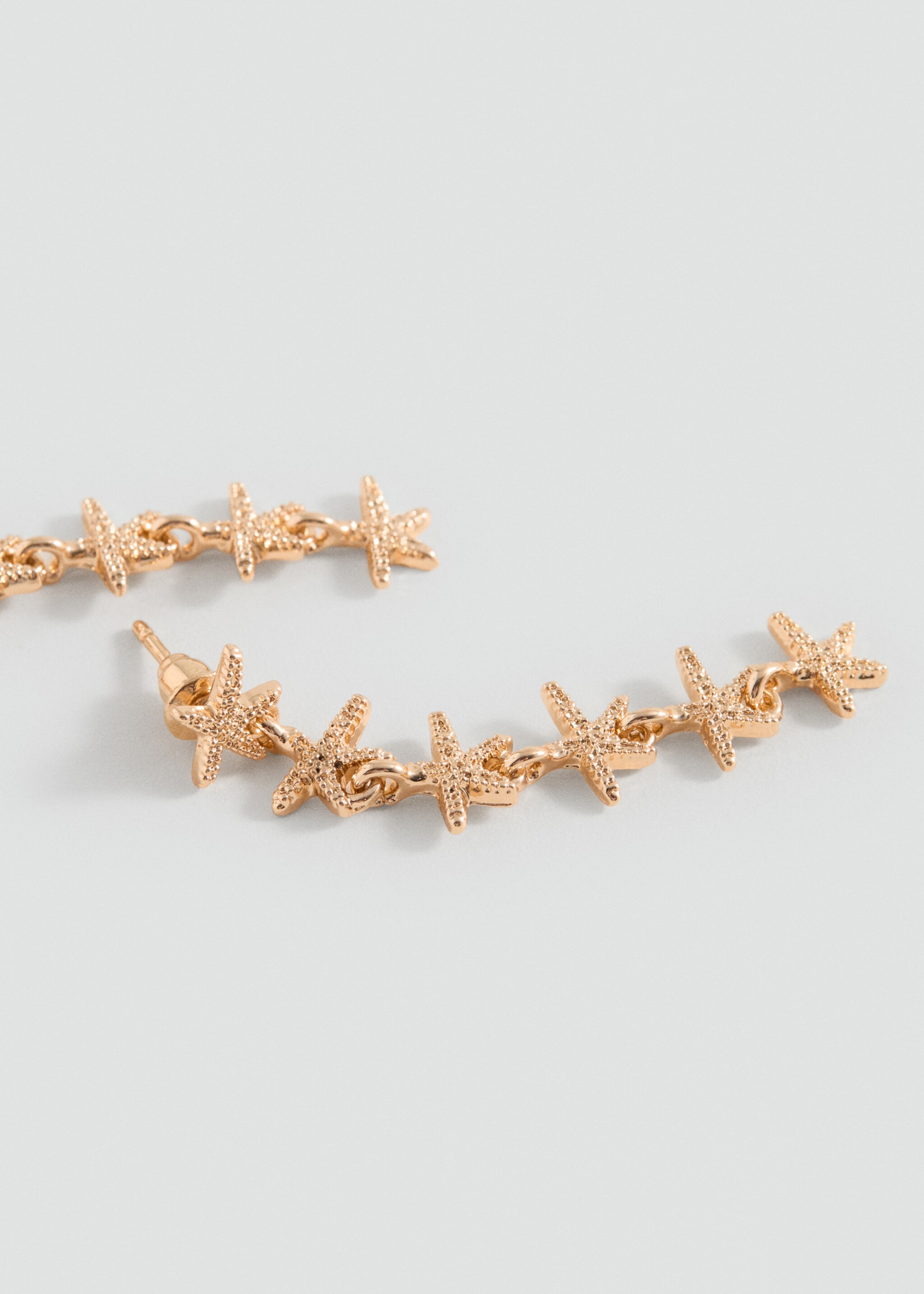 Boucles d'oreilles pendantes étoiles - Plan moyen, Or. Ref: 87076362-00.