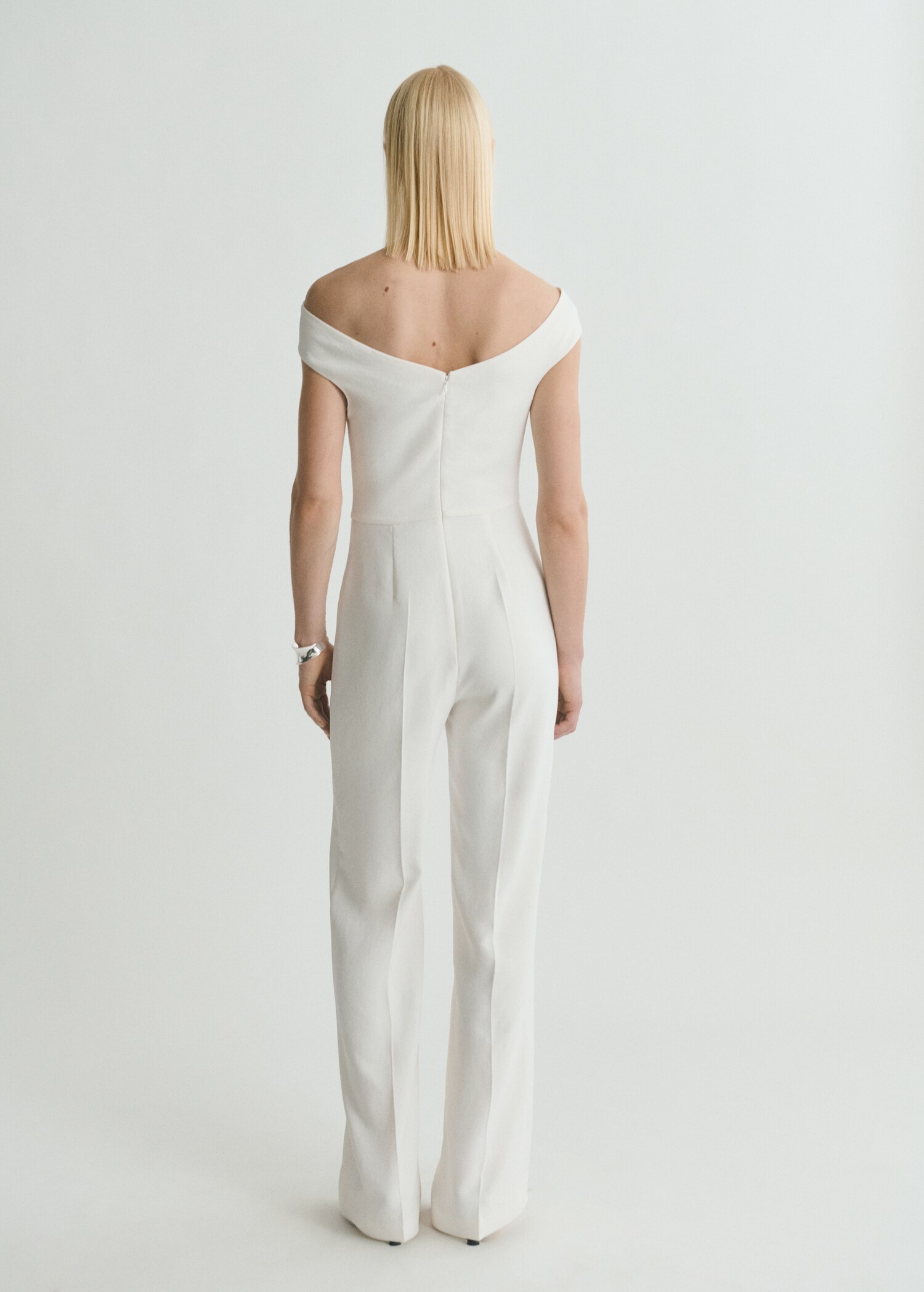 Long jumpsuit with asymmetrical neck - Reverse of the article