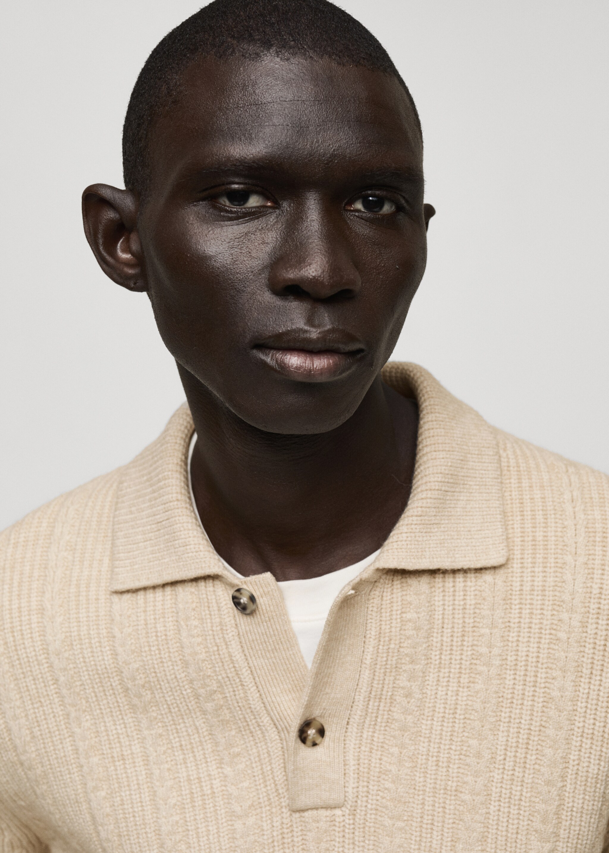 Knitted structured polo sweater - Details of the article 1, Ecru. Ref: 87080599-00.