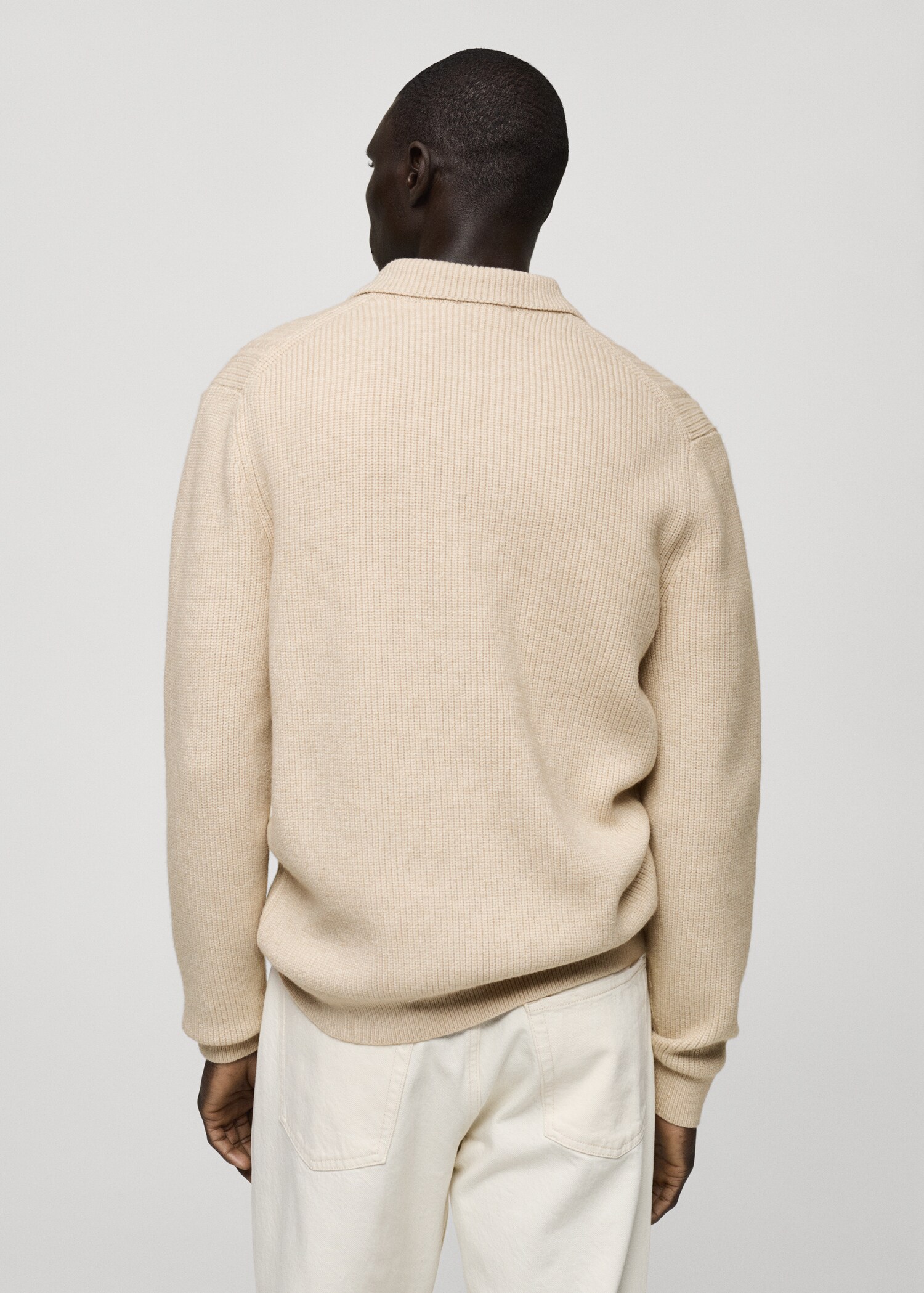 Knitted structured polo sweater - Reverse of the article