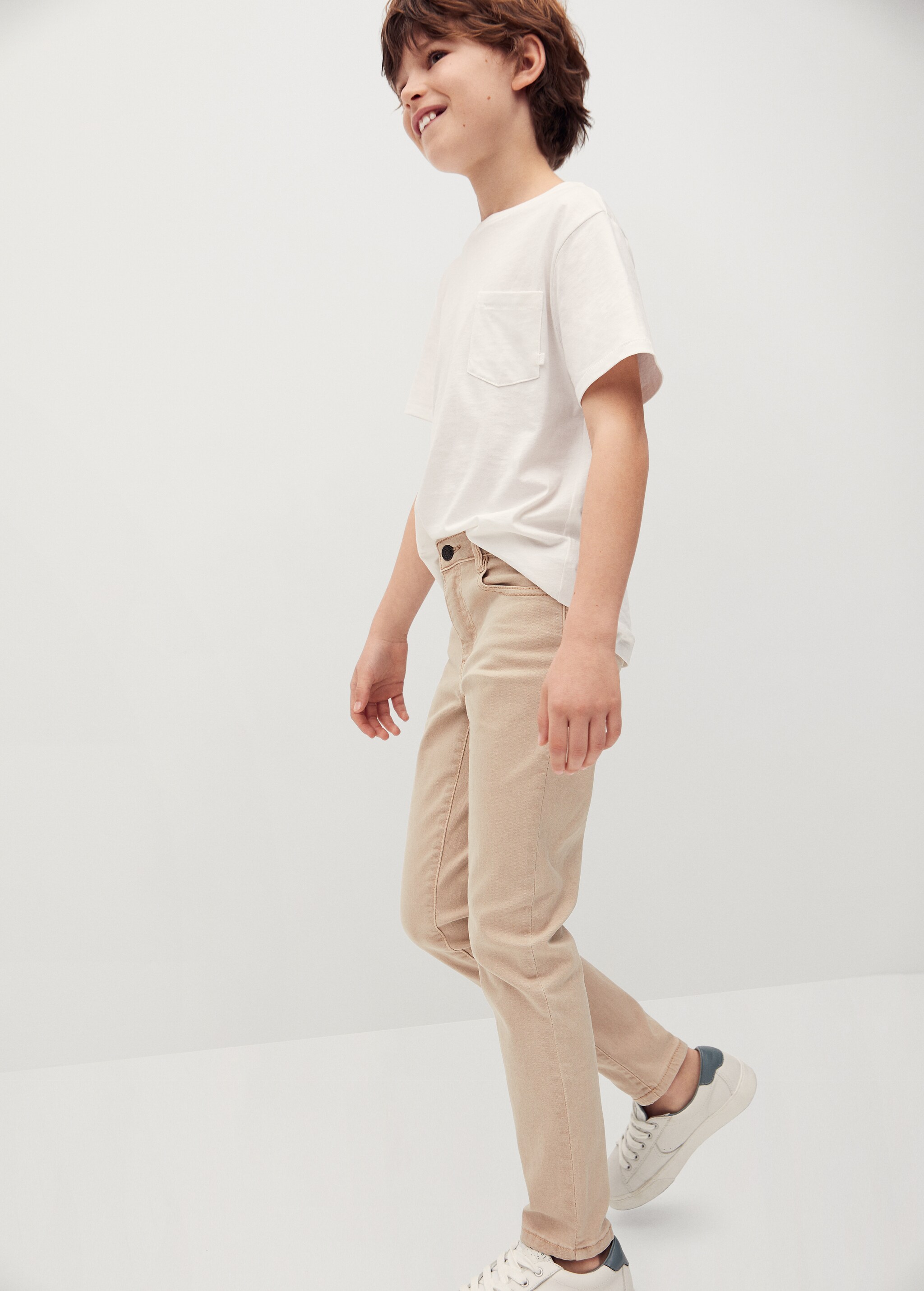 Bavlněné kalhoty slim fit - Náhled ve středové rovině