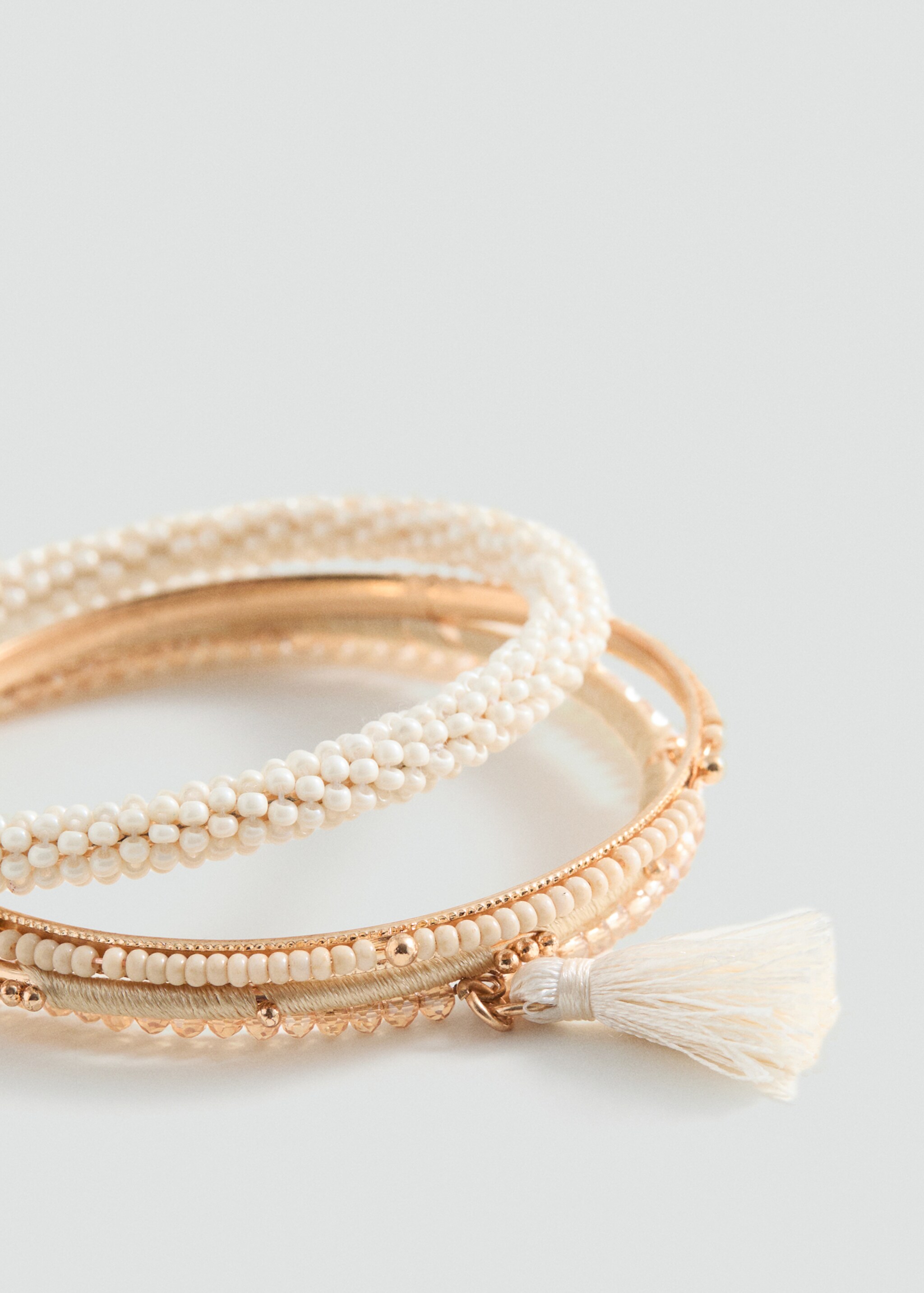 Tassel bracelet set - Medium plane, Sand. Ref: 87083647-00.