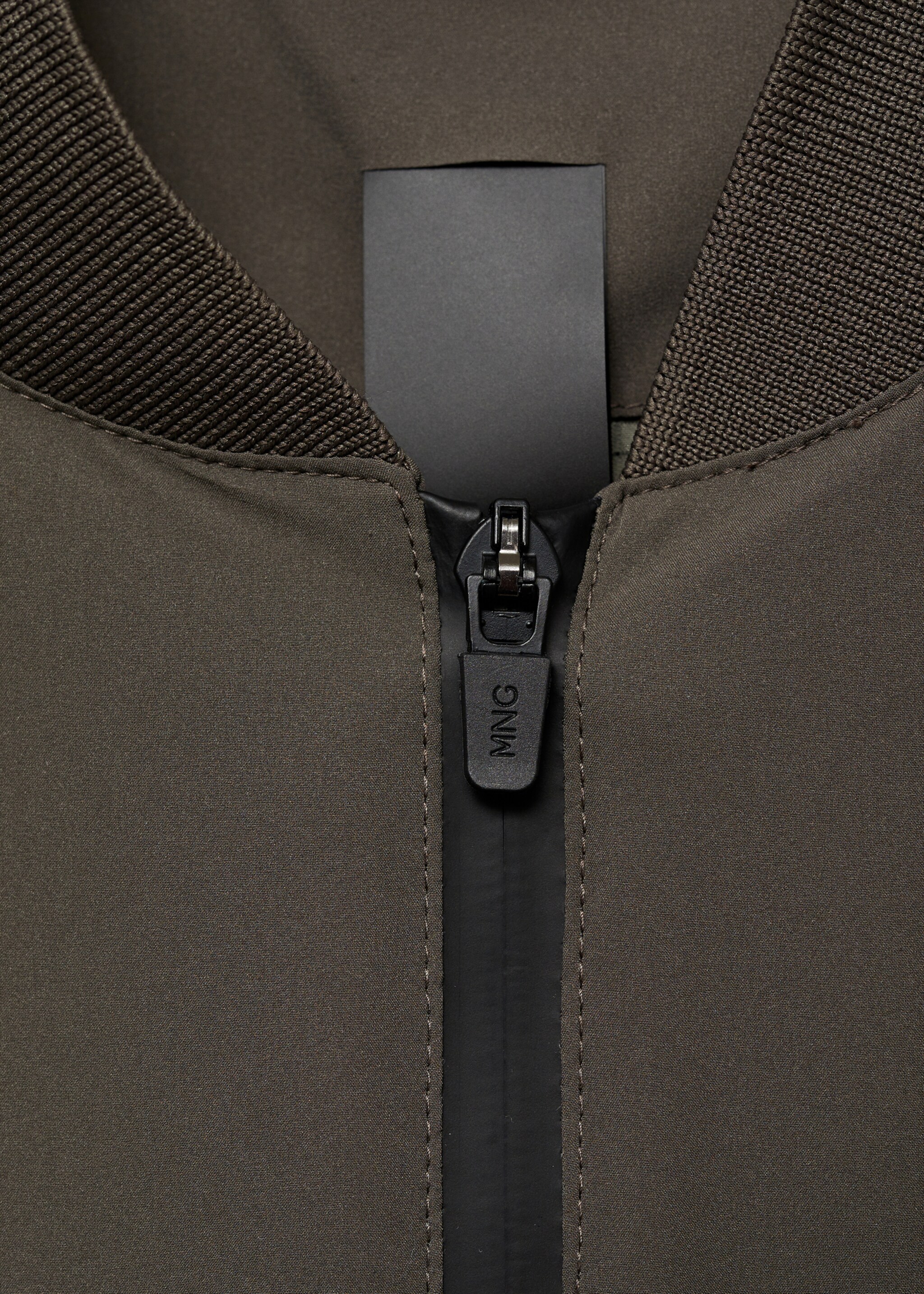 Waterproof bomber with COOLMAX® technology - Details of the article 8, Medium Green. Ref: 87084388-00.