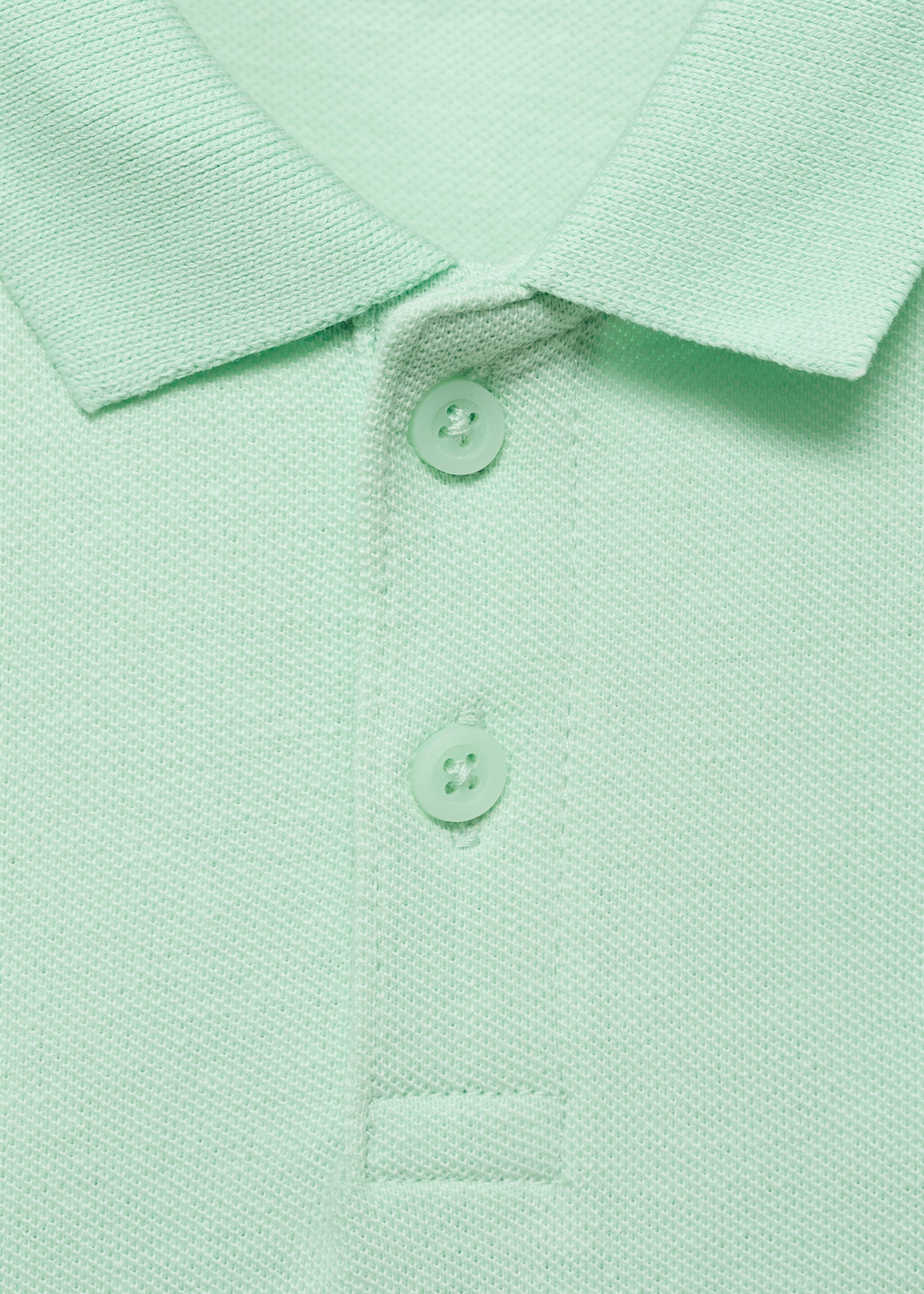 Gebreid poloshirt met korte mouw - Detail van het artikel 8, Appelgroen. Ref: 87084390-00.