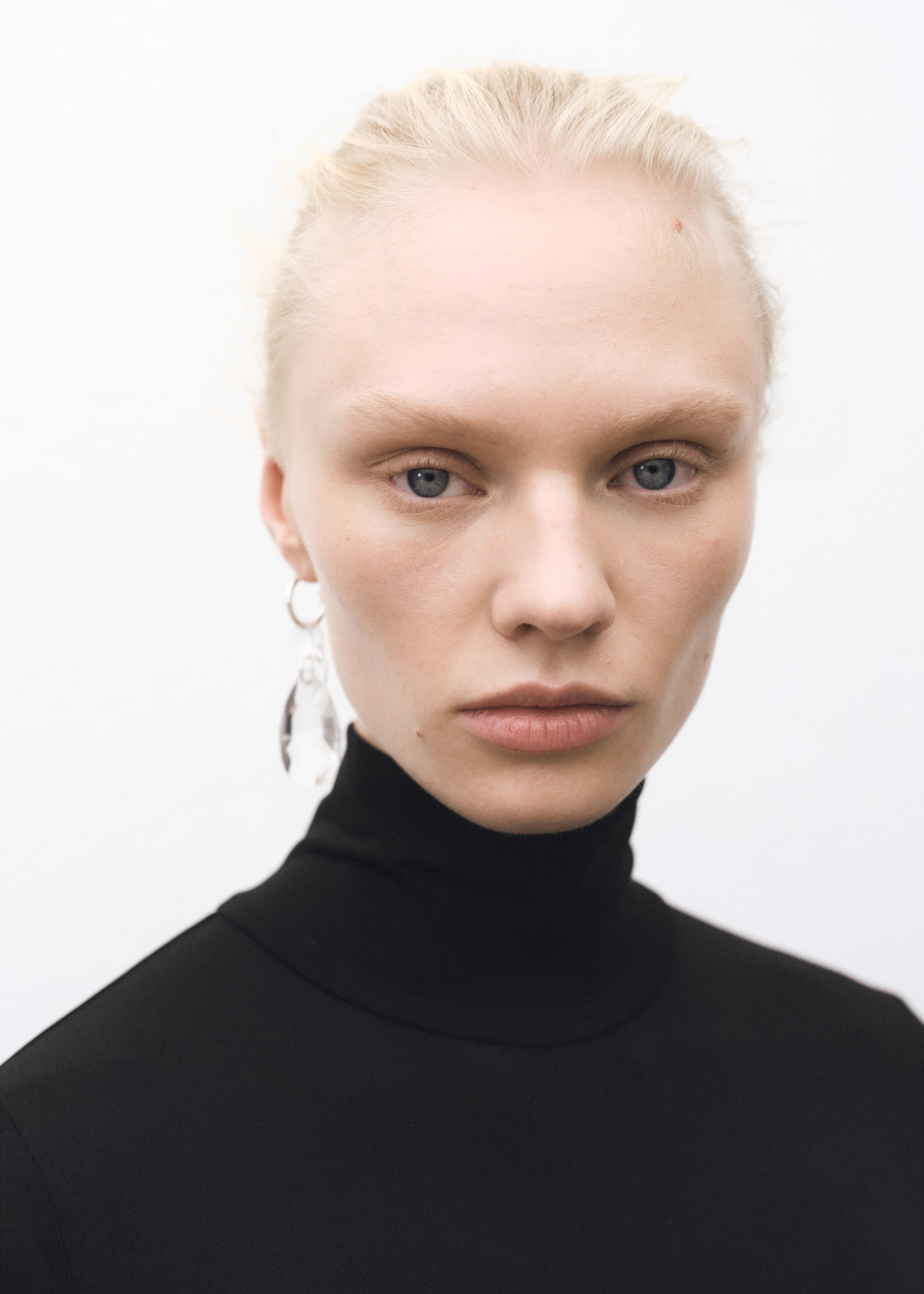 Turtleneck flared knitted dress - Details of the article 1, Black. Ref: 87084423-00.