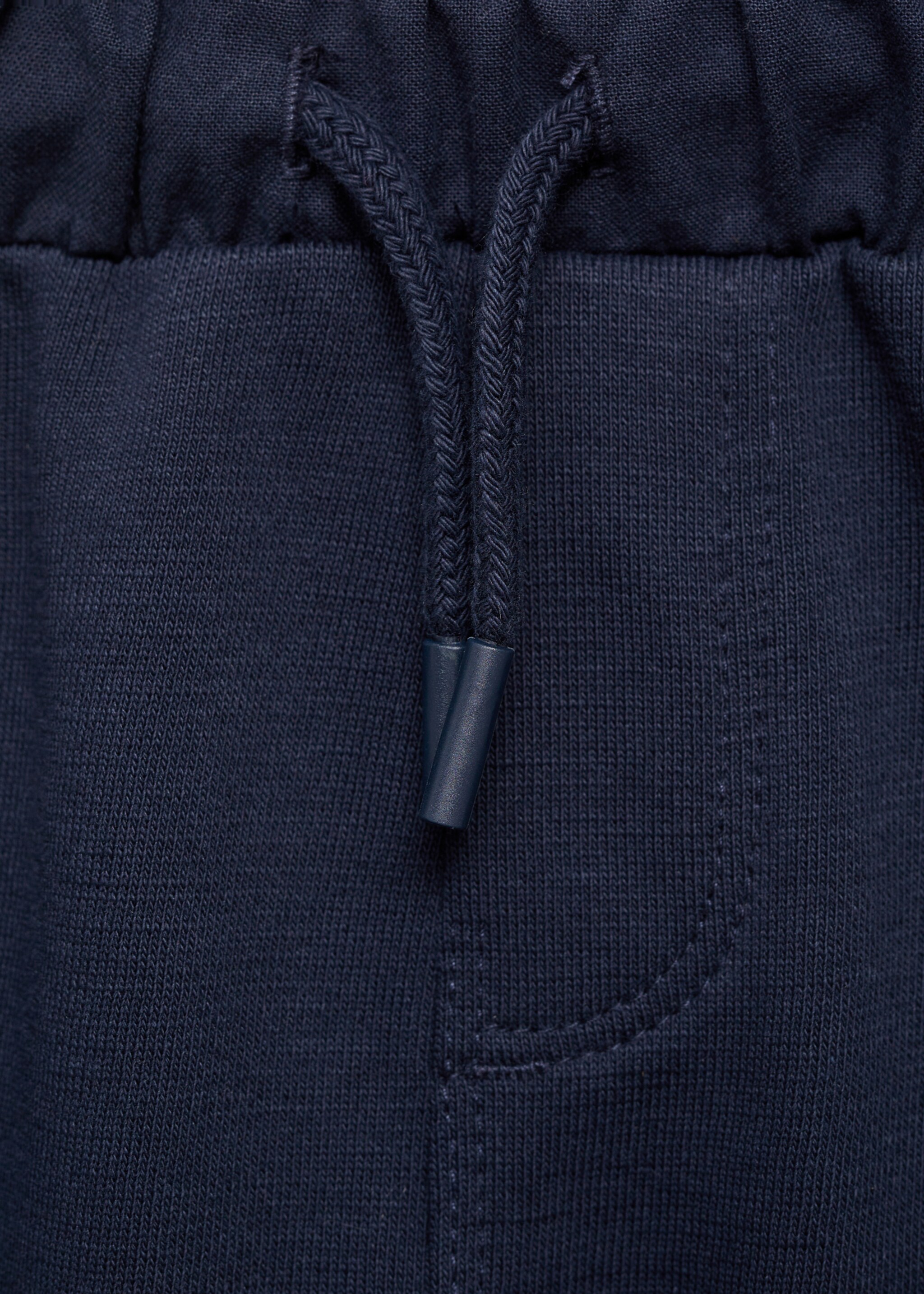 Knit jogger-style trousers - Details of the article 8, Dark Navy. Ref: 87084786-00.