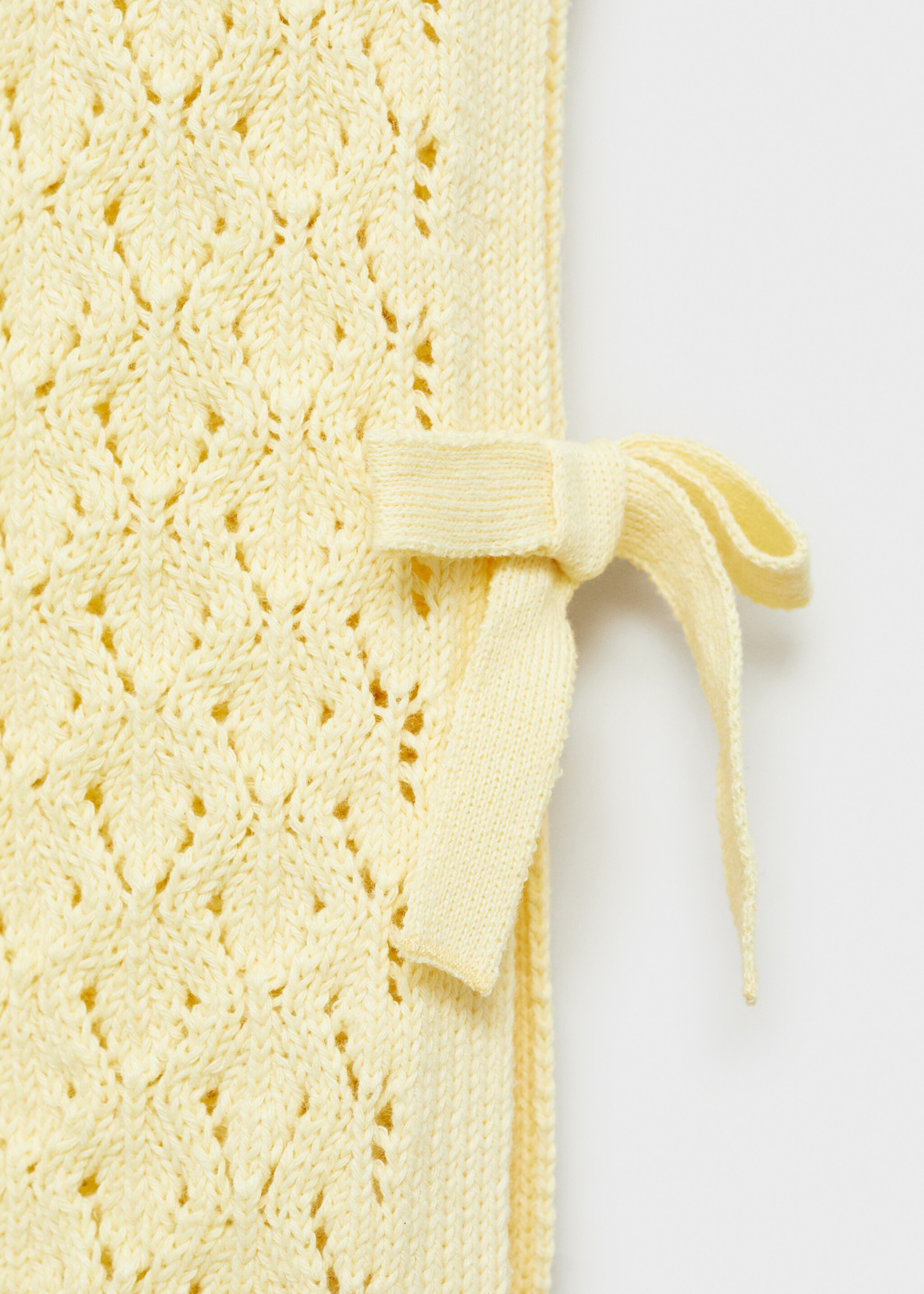 Knitted gilet with openwork details - Details of the article 0, Pastel Yellow. Ref: 87084804-00.