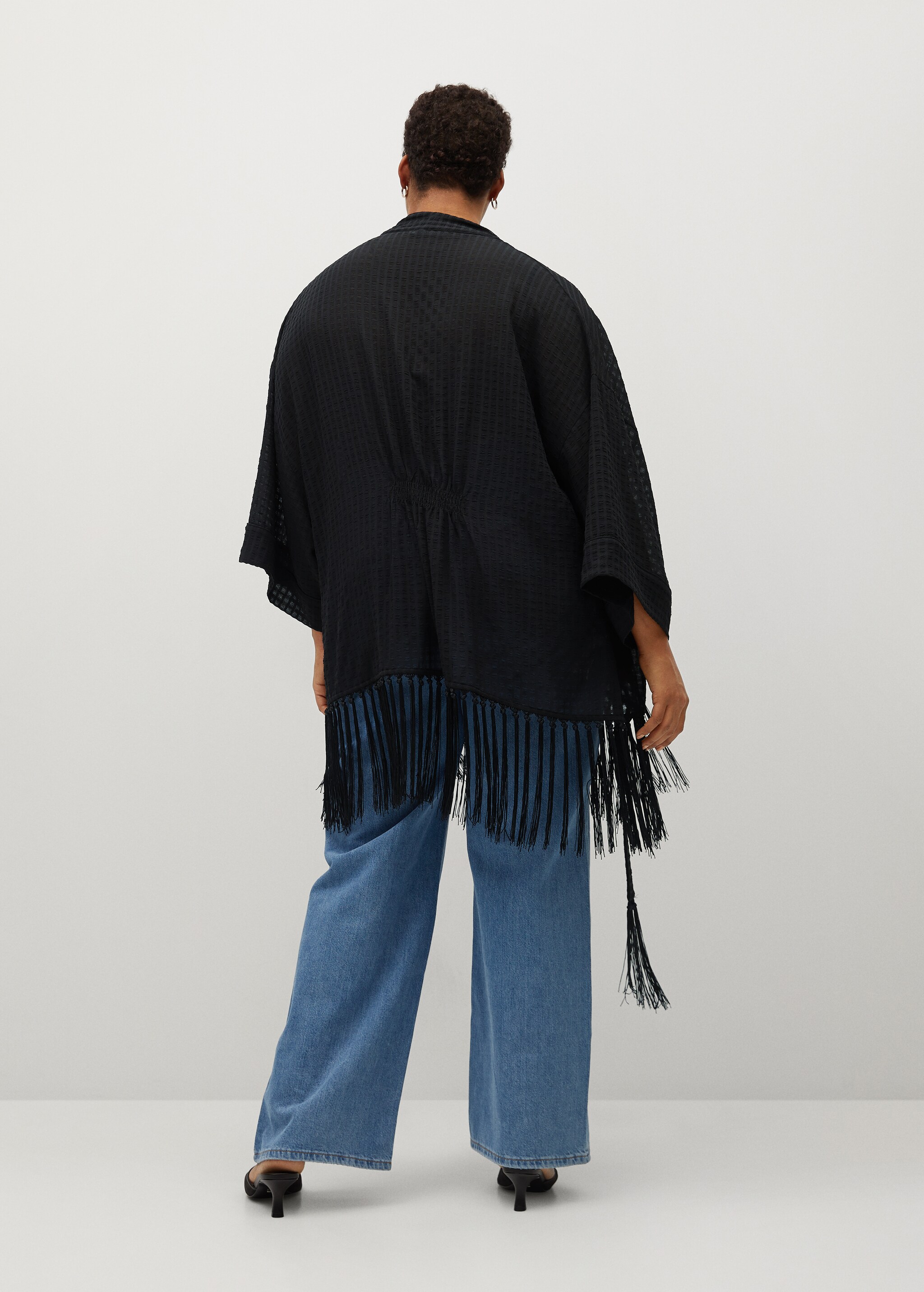 Chaqueta textura flecos - Reverso del artículo