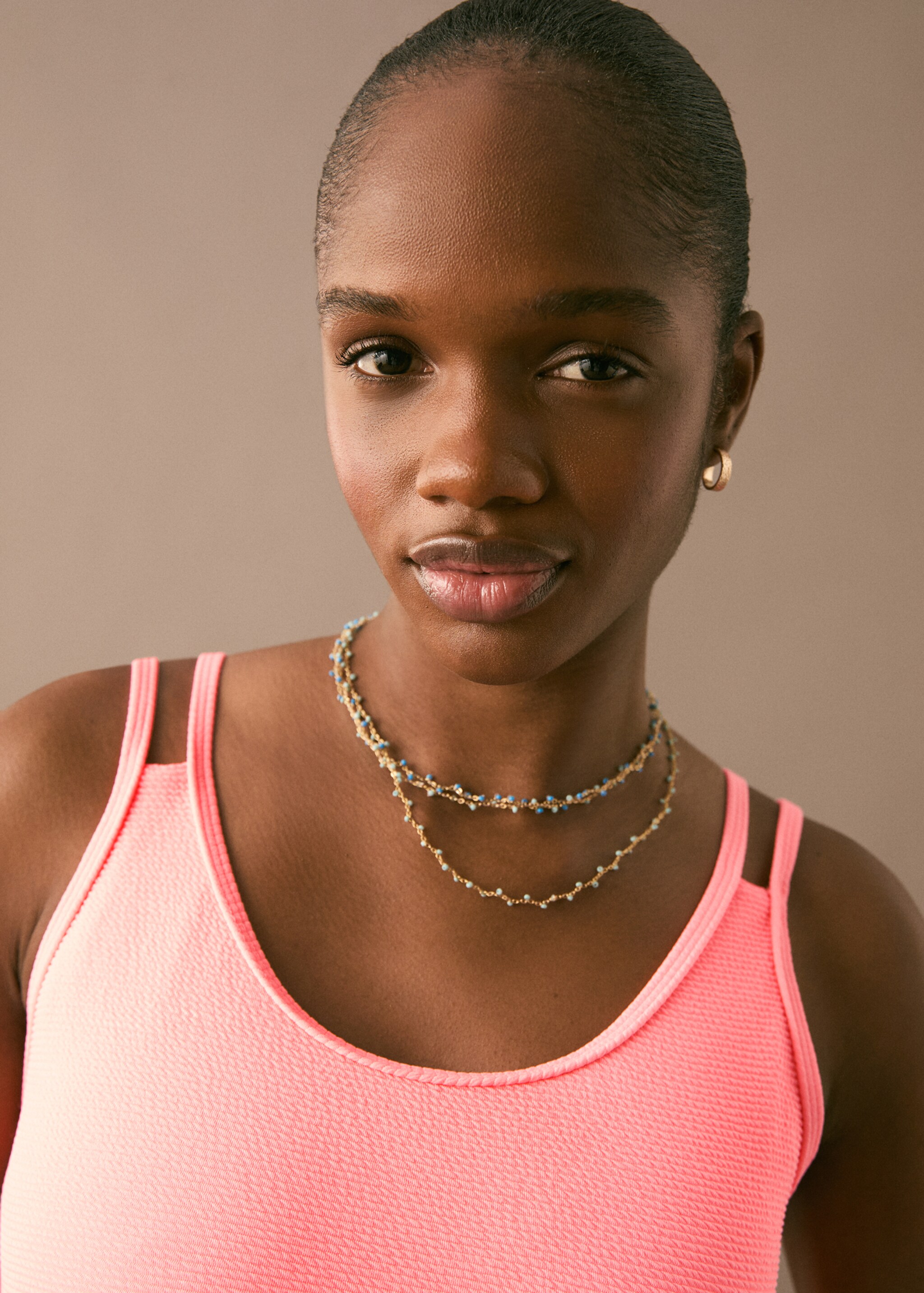 Textured swimsuit - Details of the article 1, Coral Red. Ref: 87087174-00.
