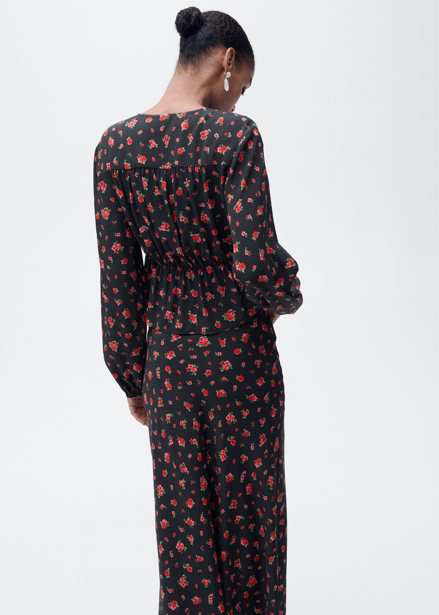 Ruffled floral blouse - Reverse of the article