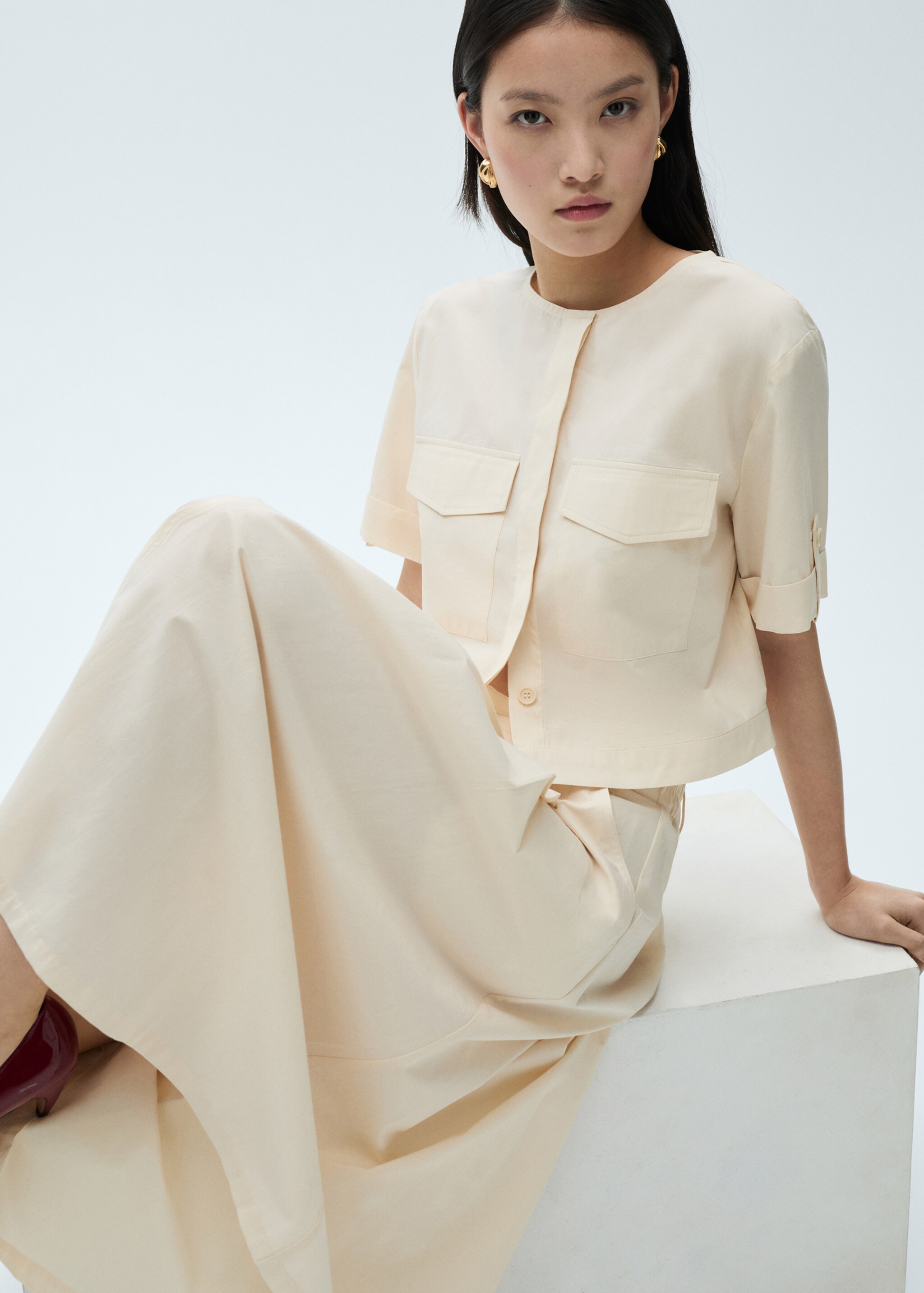 Pleated midi-skirt - Details of the article 1, Ecru. Ref: 87090577-00.