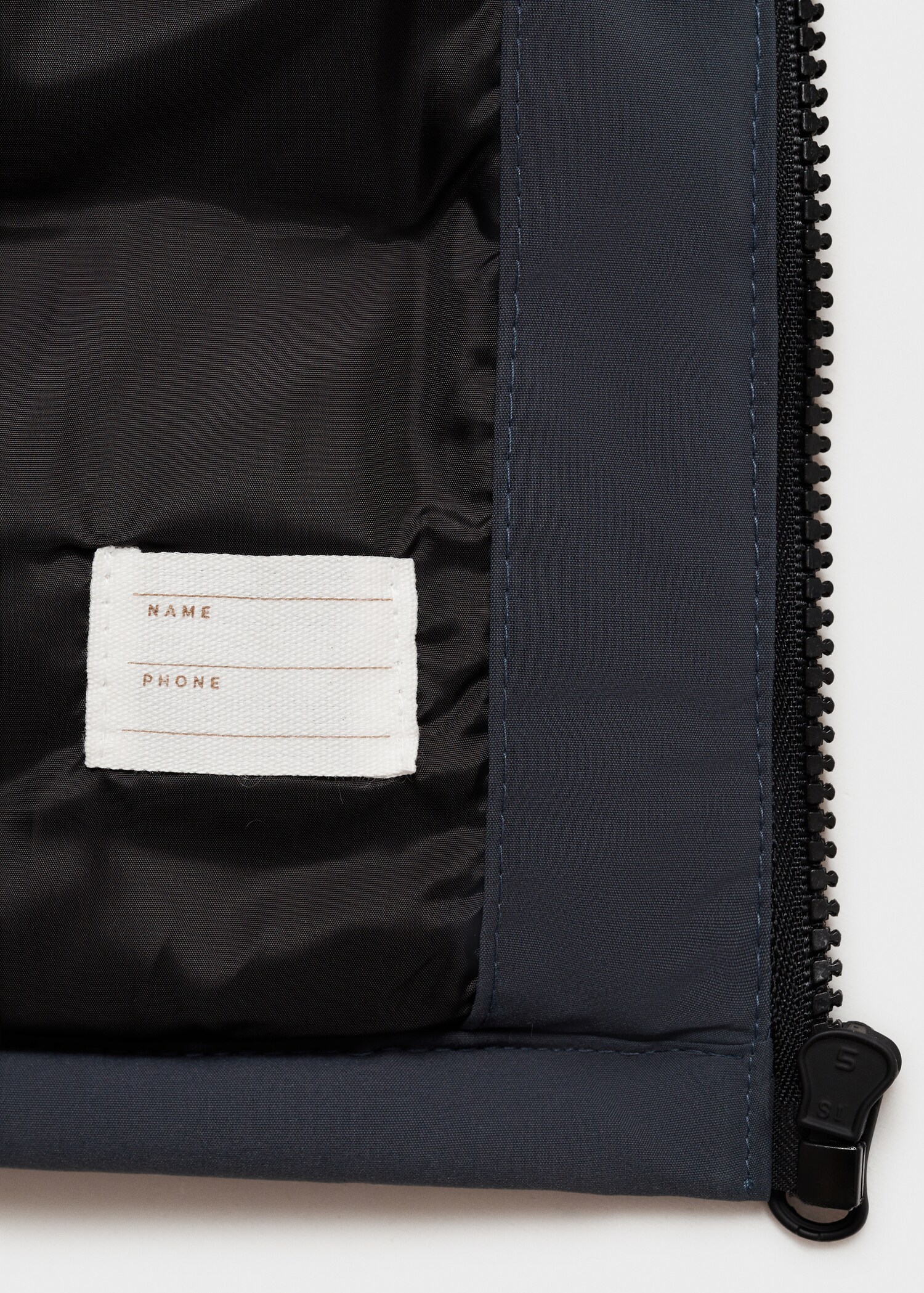 Gilet matelassé à capuche - Détail de l'article 8