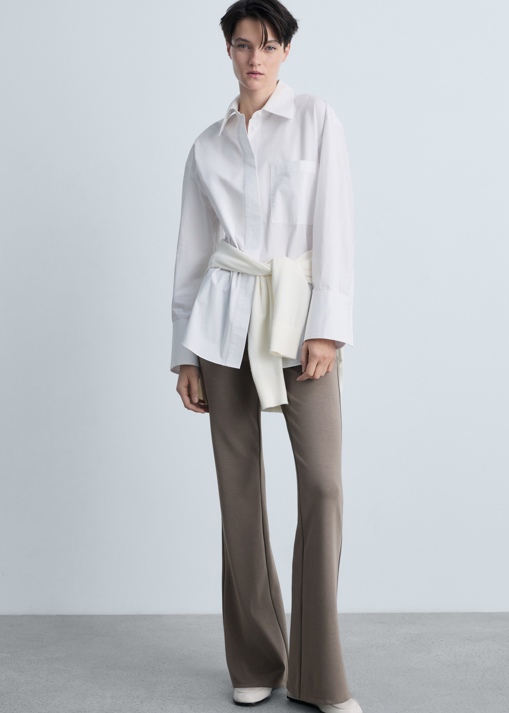 Flared knitted trousers - Details of the article 2, Medium Brown. Ref: 87093274-00.