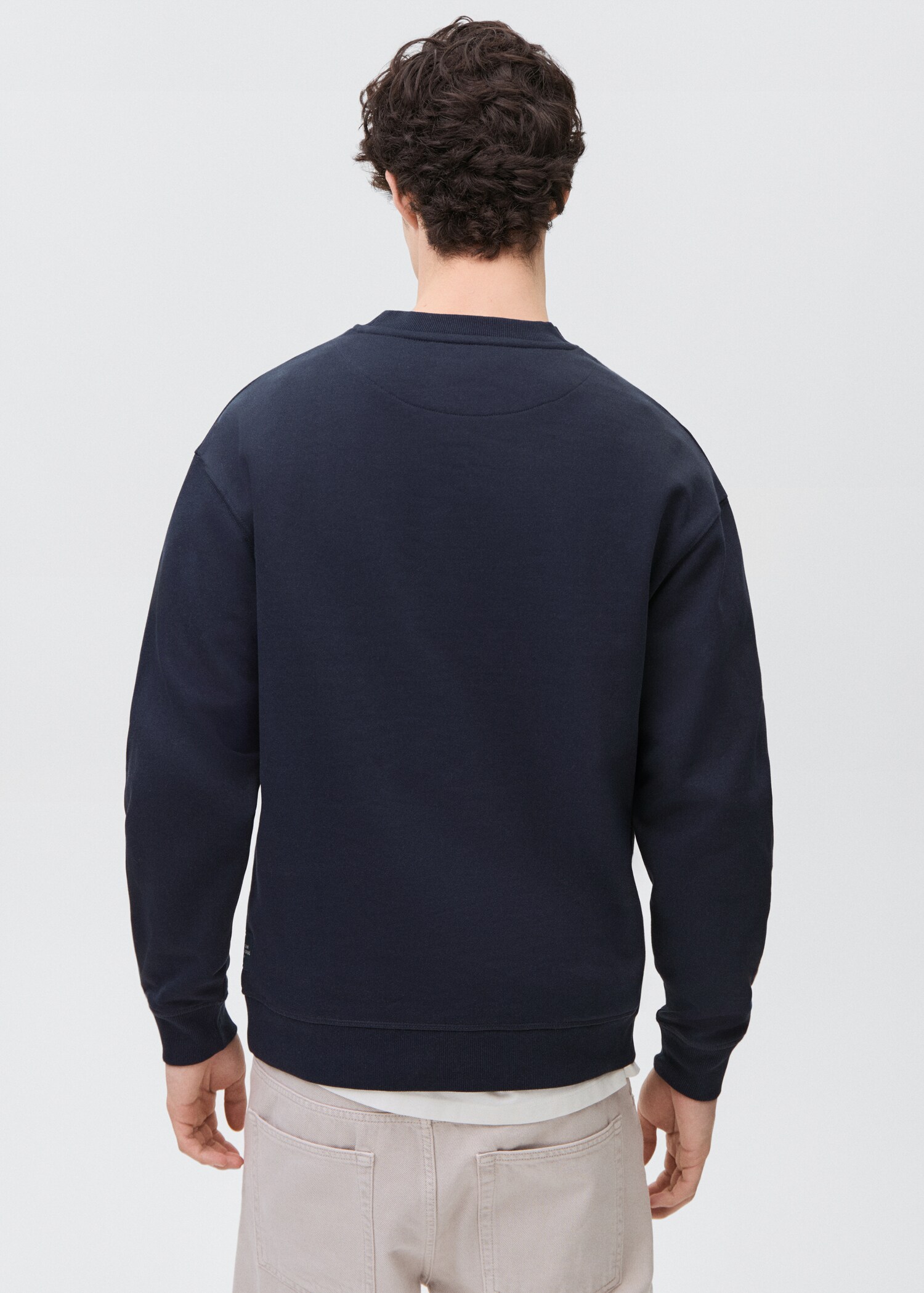 Dessuadora cotó missatge relleu - Revers de l'article