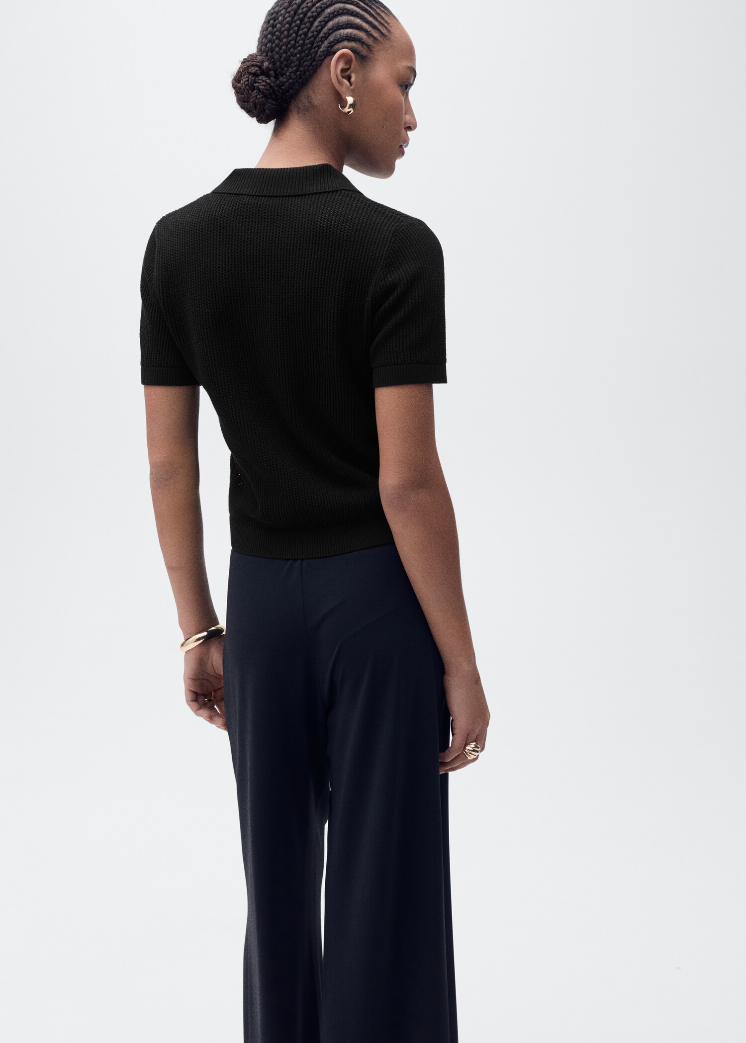 Openwork knitted polo-neck sweater - Reverse of the article