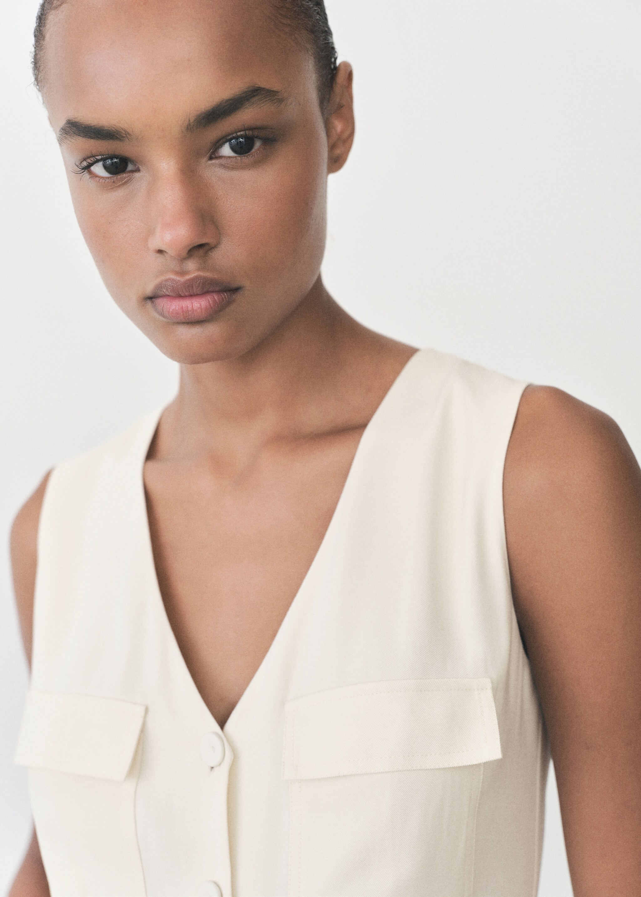 Belt long jumpsuit - Details of the article 1, Ecru. Ref: 87095749-00.