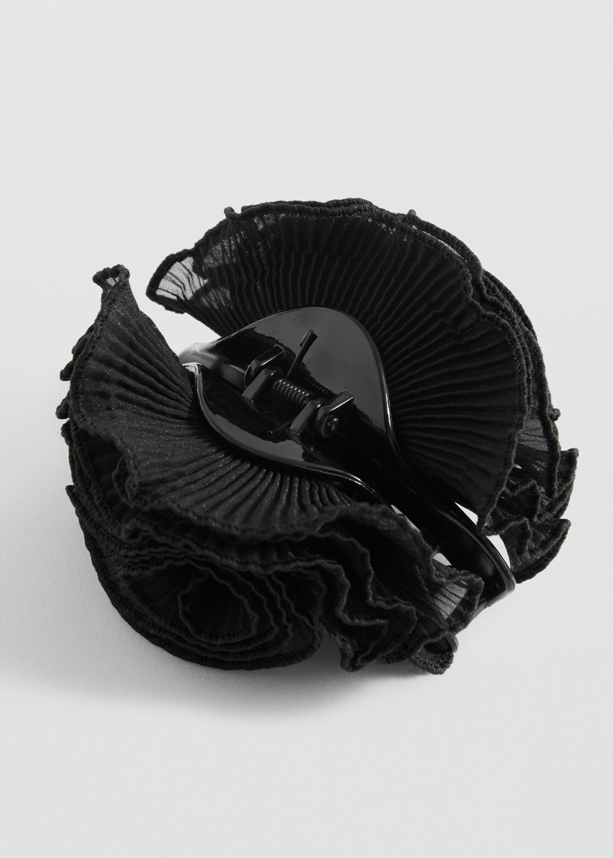 Pinza pelo flor textura - Plano medio, Negro. Ref: 87095925-00.