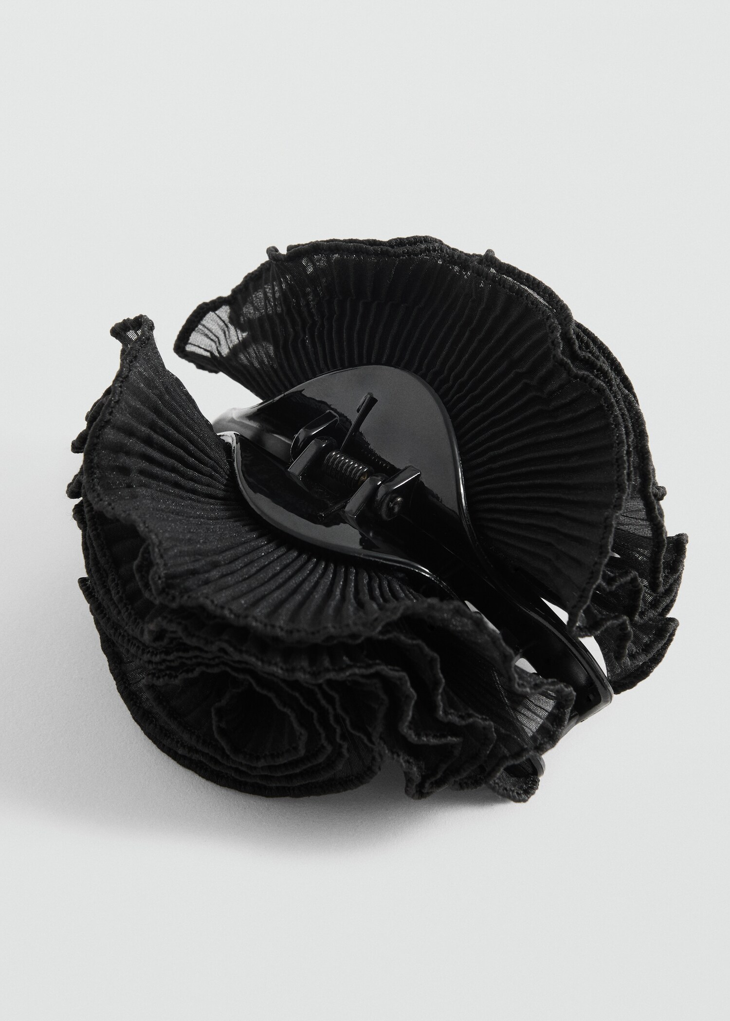 Pinza pelo flor textura - Plano medio