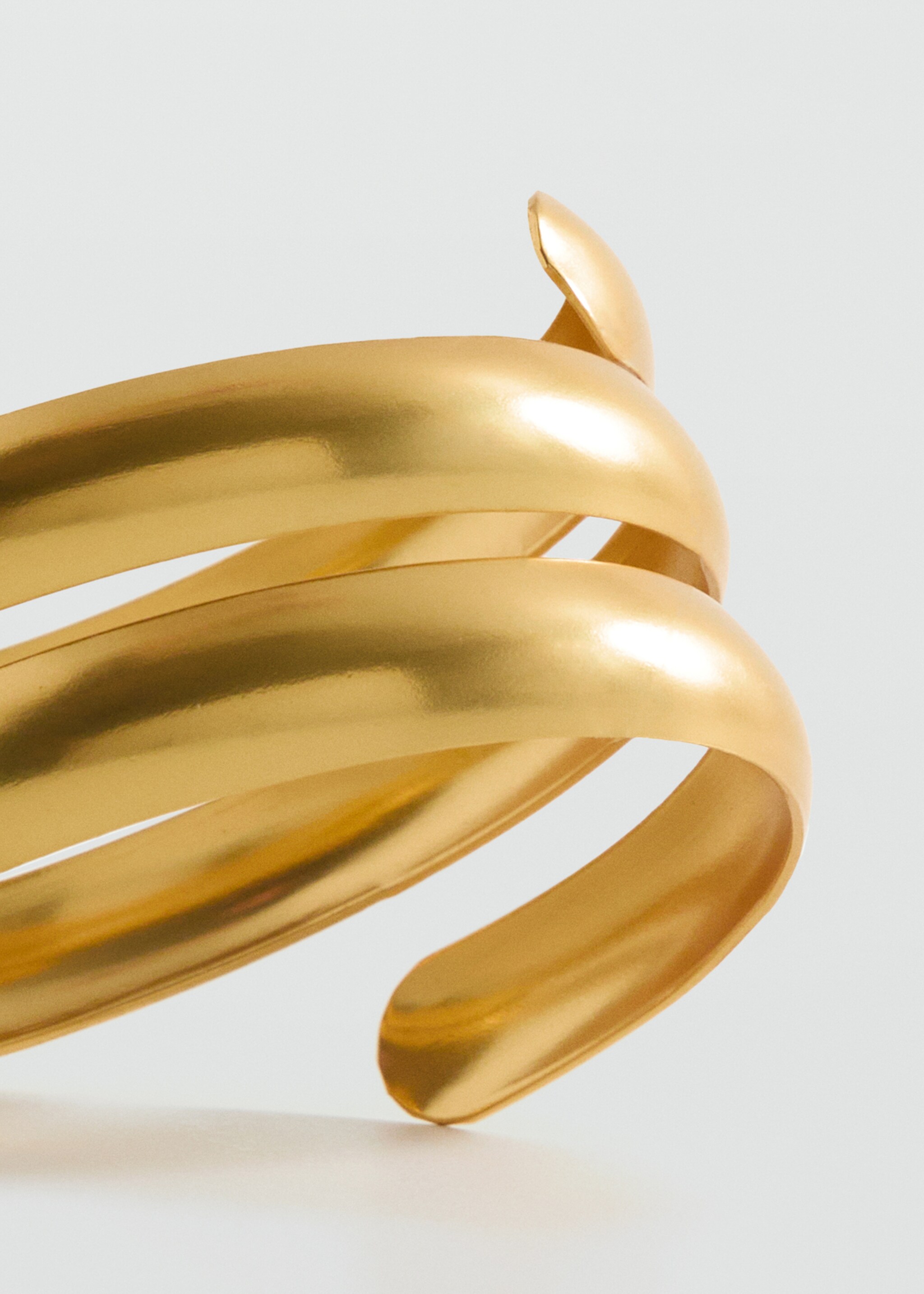 Spiral rigid bracelet - Details of the article 1, Gold. Ref: 87095984-00.