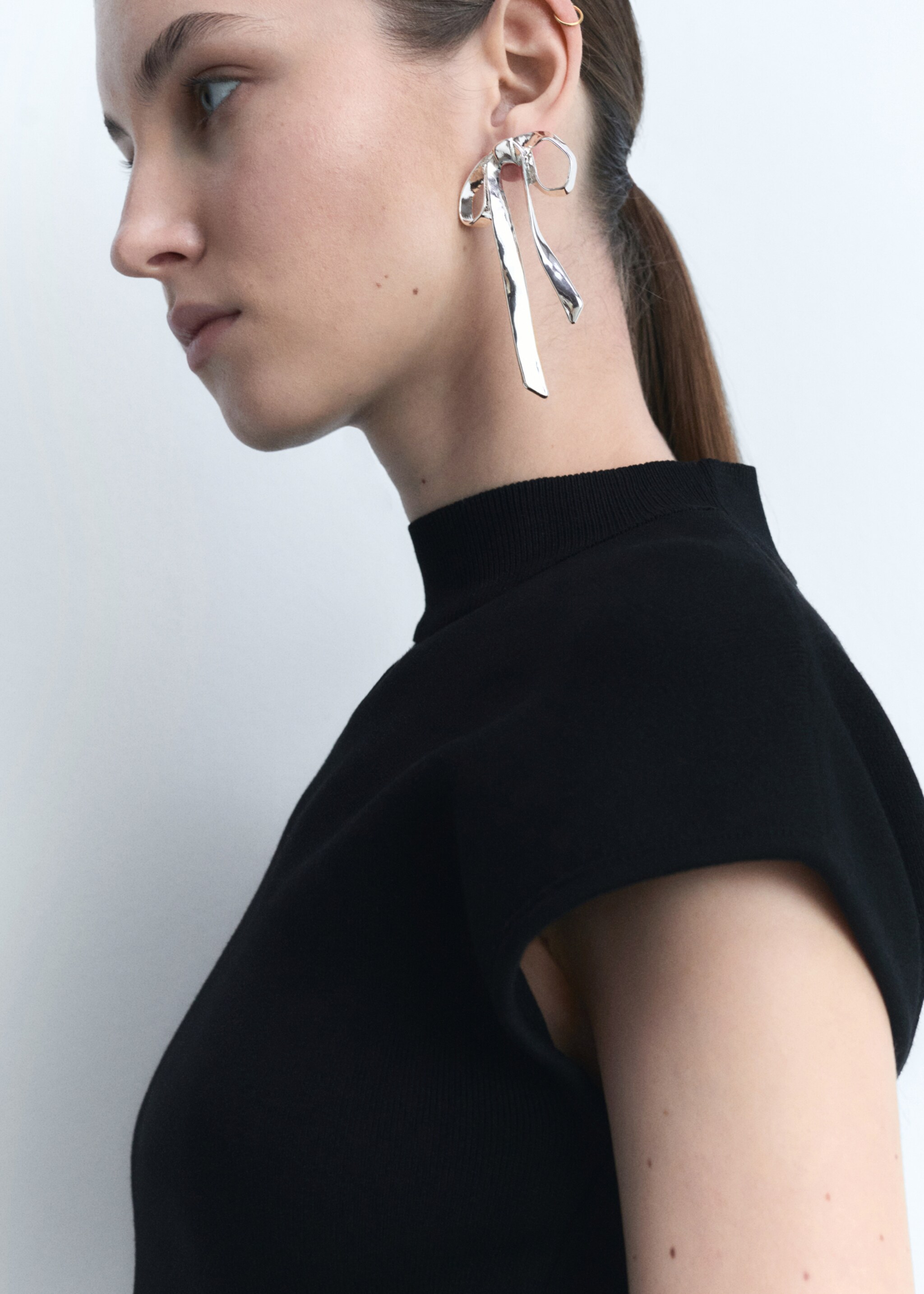 Rigid bow earrings - General plane, Silver. Ref: 87013315-00.