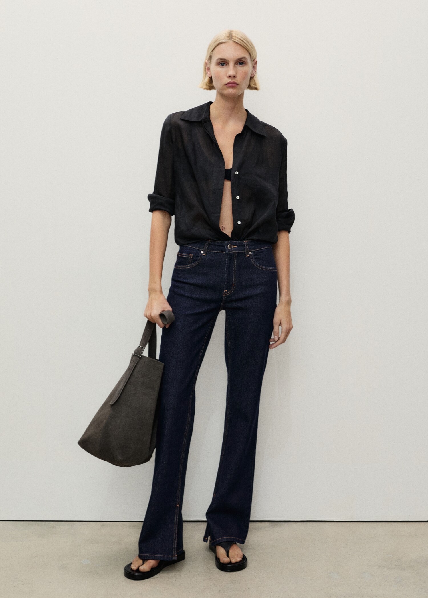 Rinse-wash flared jeans with openings - General plane