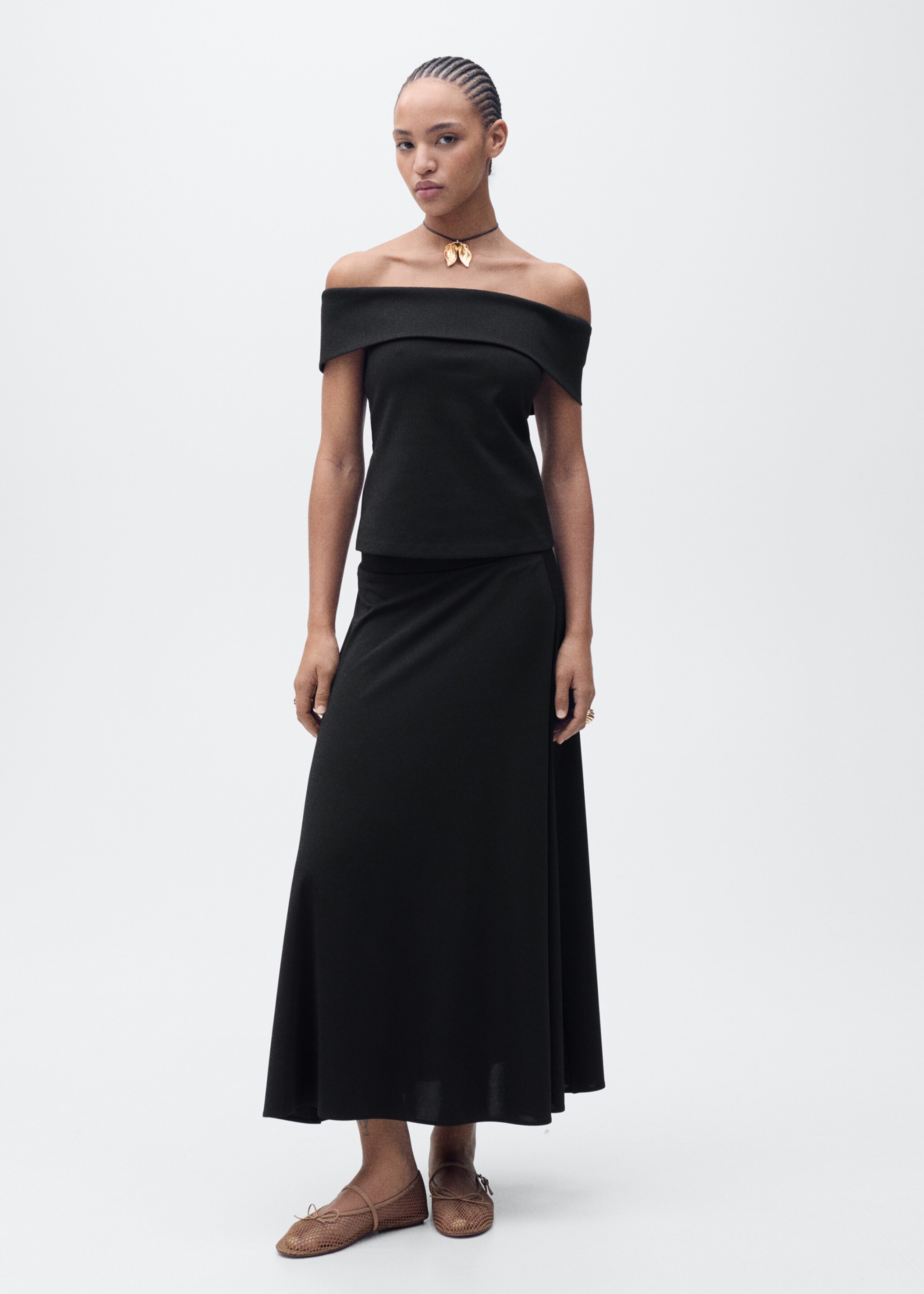 Flared knitted skirt - General plane, Black. Ref: 87075747-00.