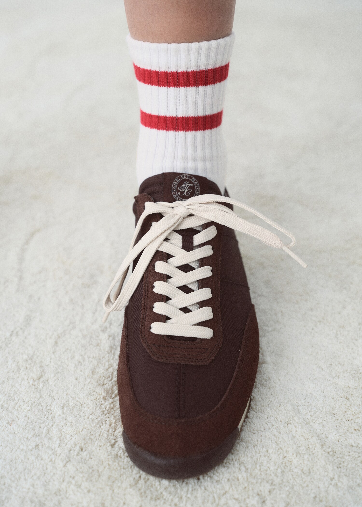 Trainers with contrasting stripe and suede panels - General plane