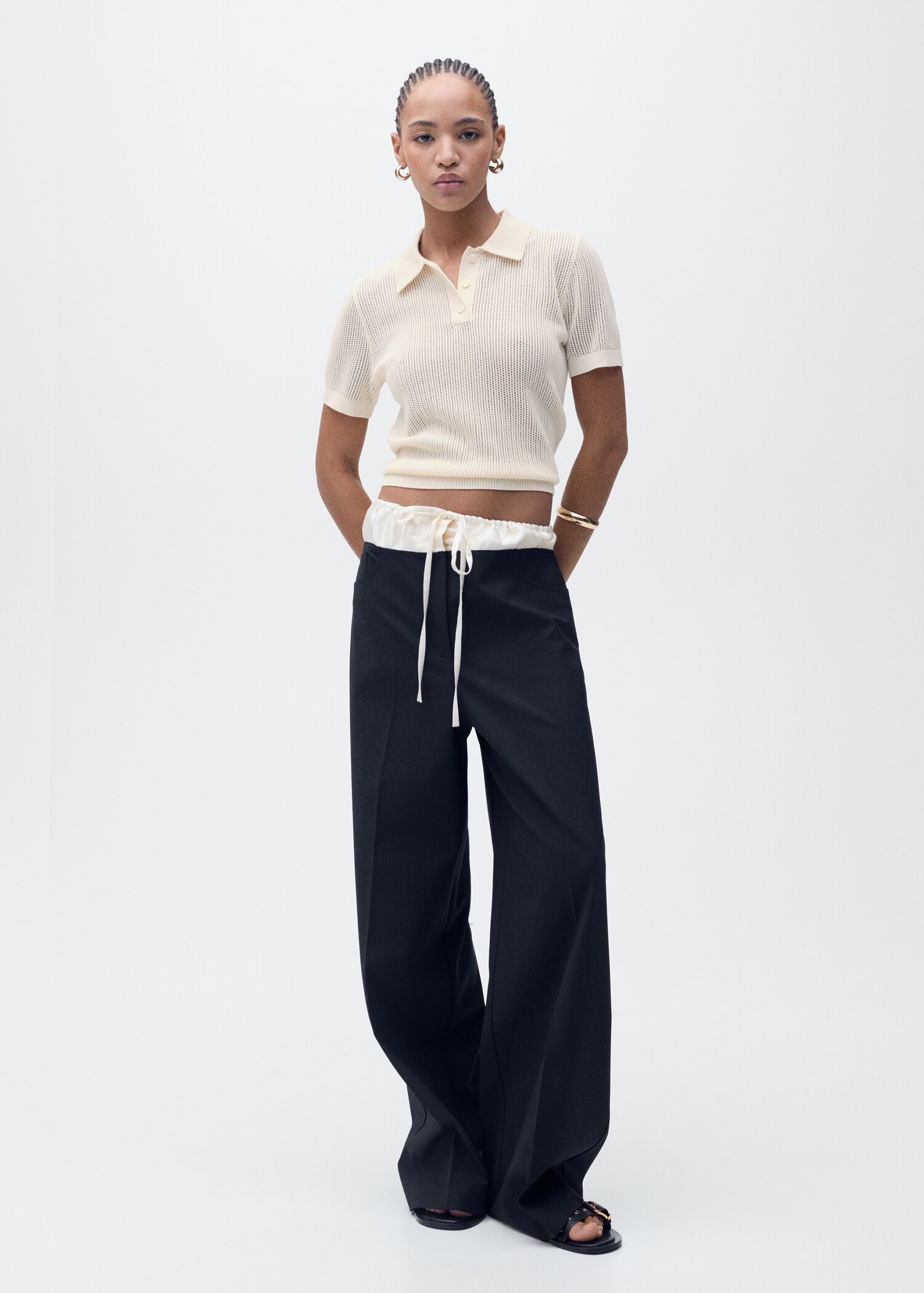 Openwork knitted polo-neck sweater - General plane